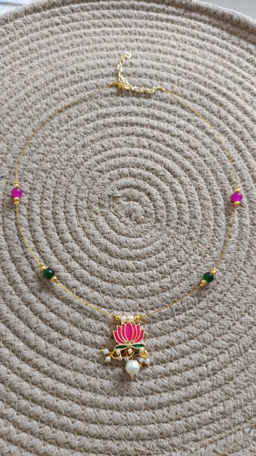The Invisible Necklace – Lotus & Colorful Garden Motif