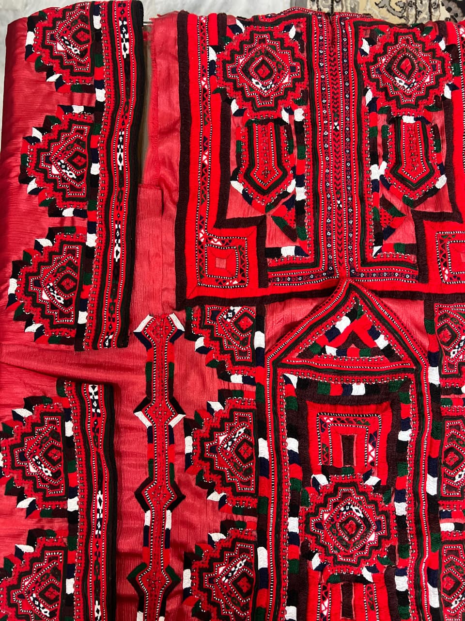 Traditional Hand-Embroidered Red Fabric