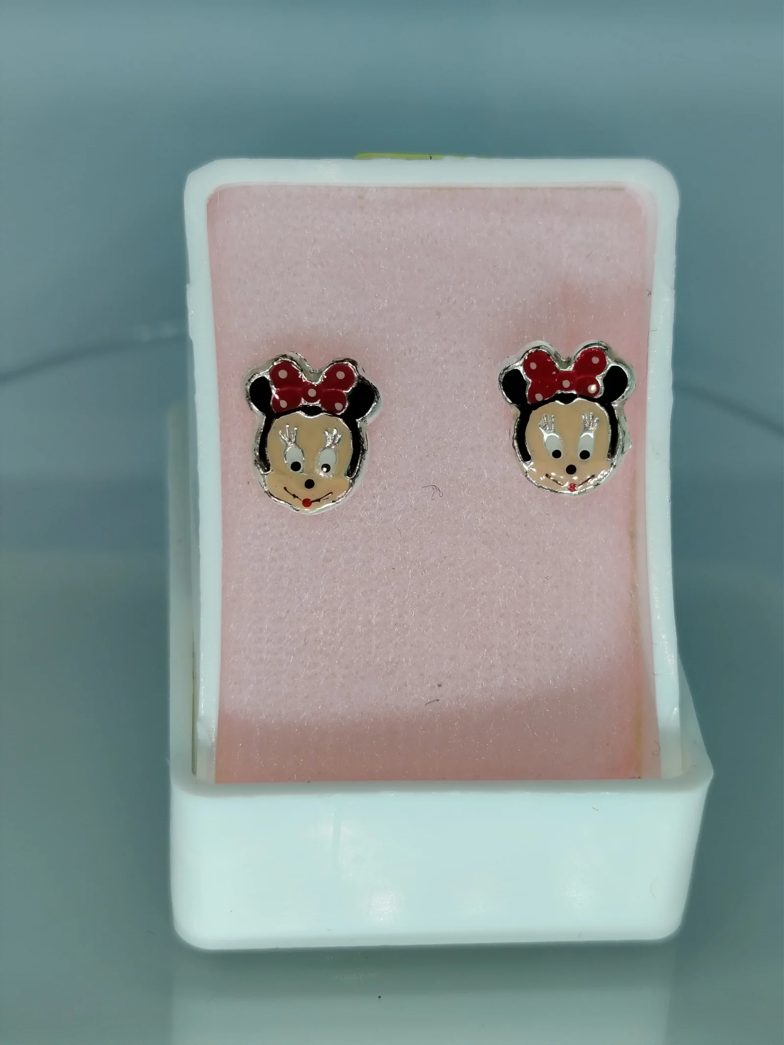 Broquel plata con bolita diseno Mimi a encapsulado a color