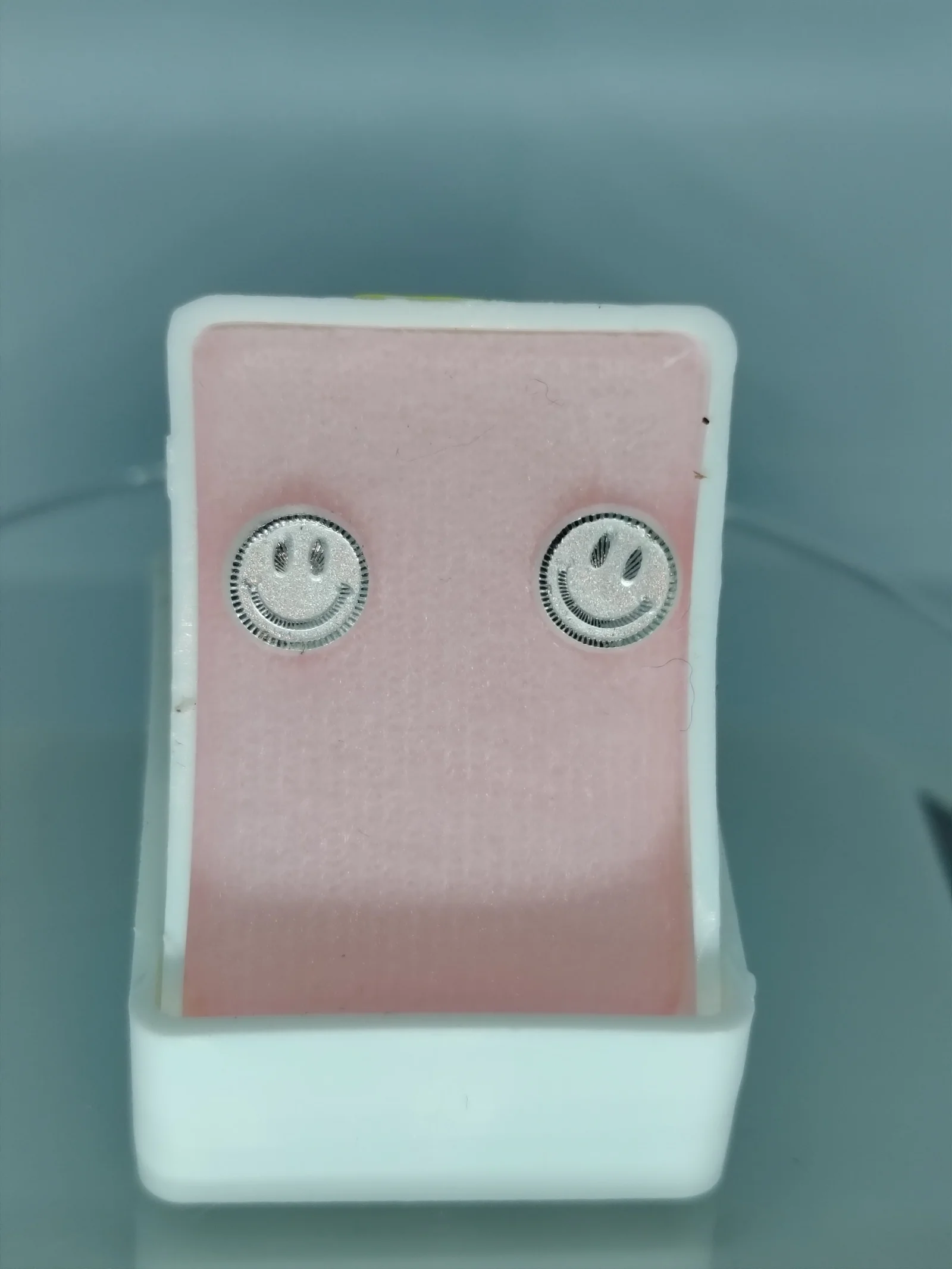 Aretes de carita feliz