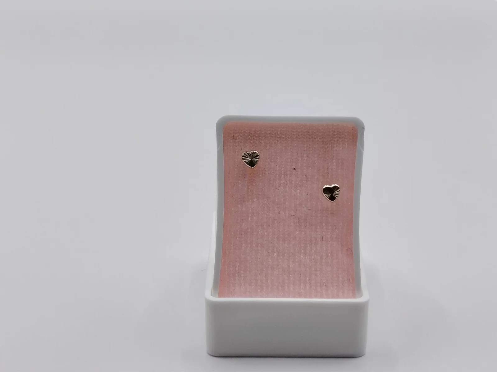 Aretes de oro 10k en forma de corazón y hoja