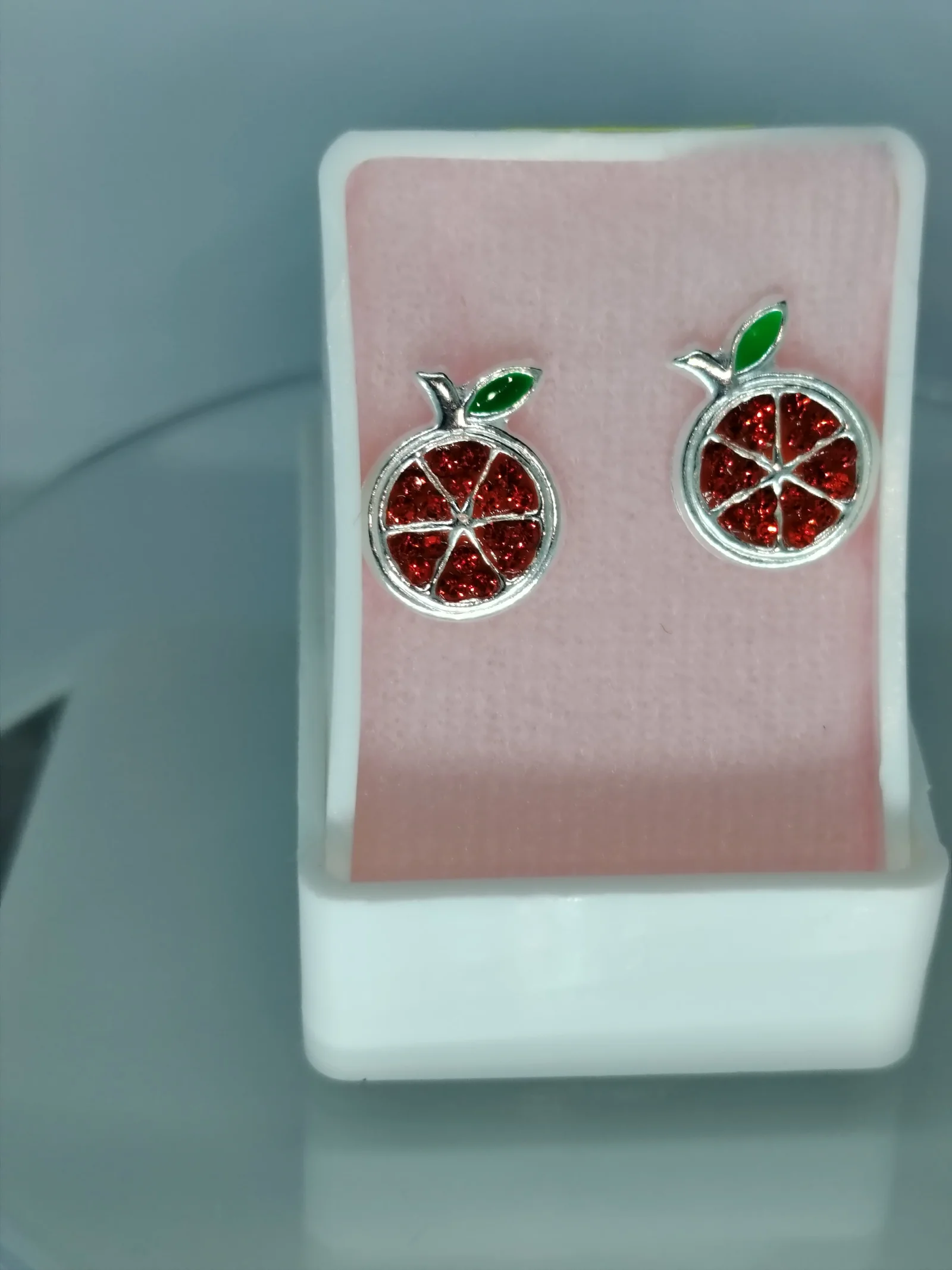 Aretes de fruta naranja con zirconias