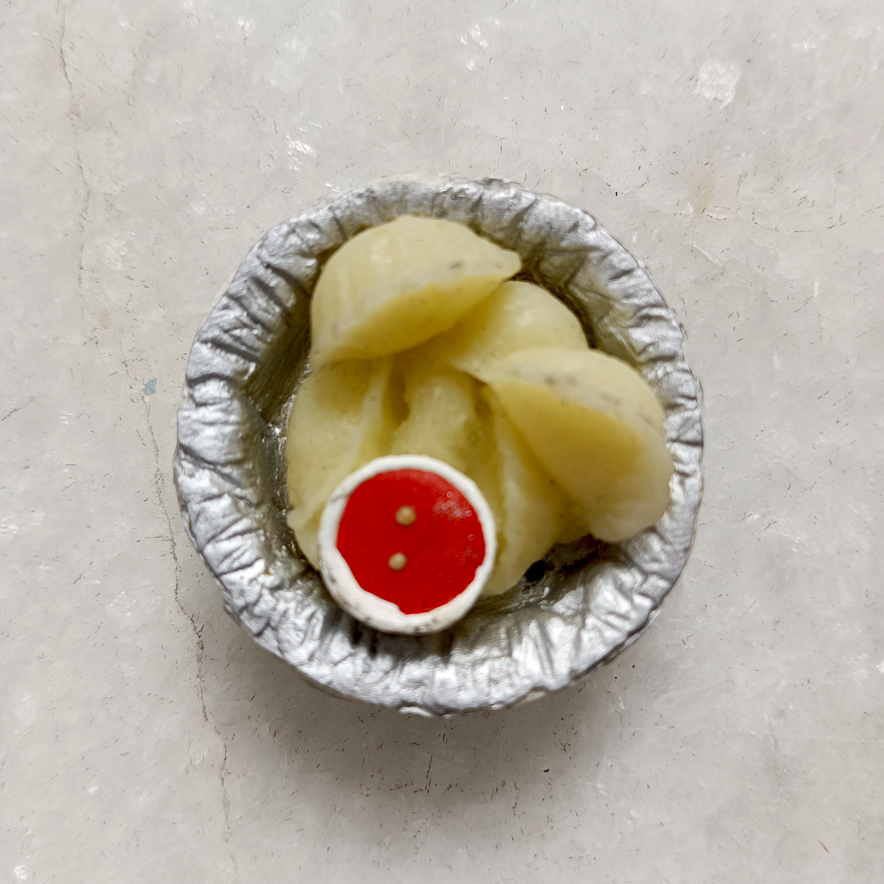 Miniature Momos Fridge Magnet