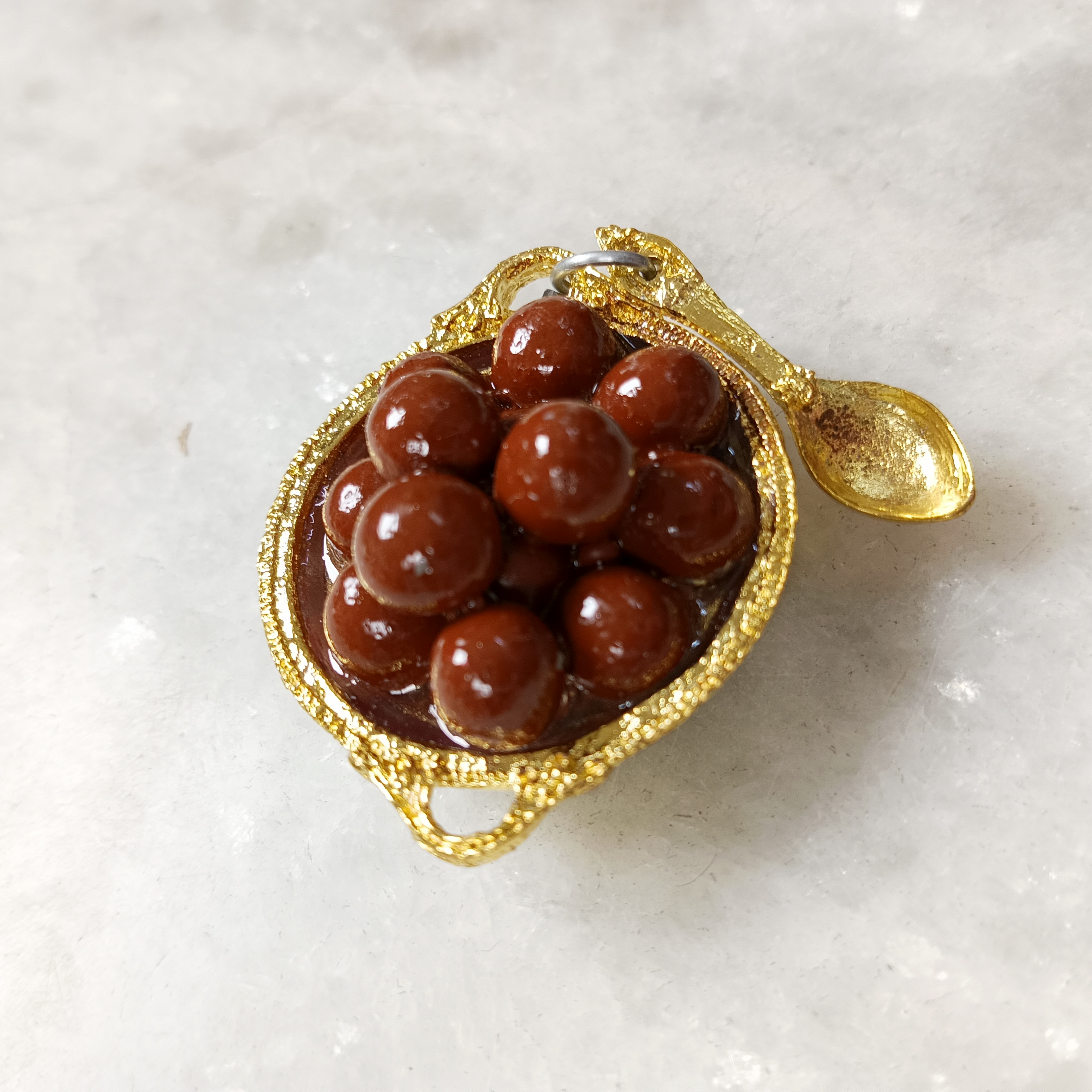 Miniature Gulab Jamun on Golden Thali Fridge Magnet