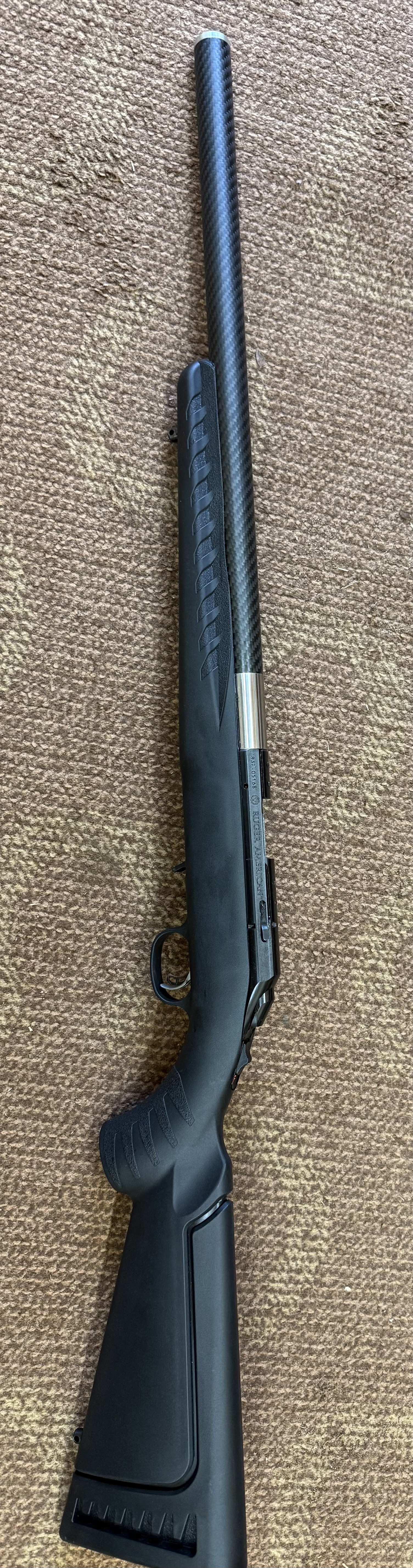 Integrally Suppressed Carbon Fiber 