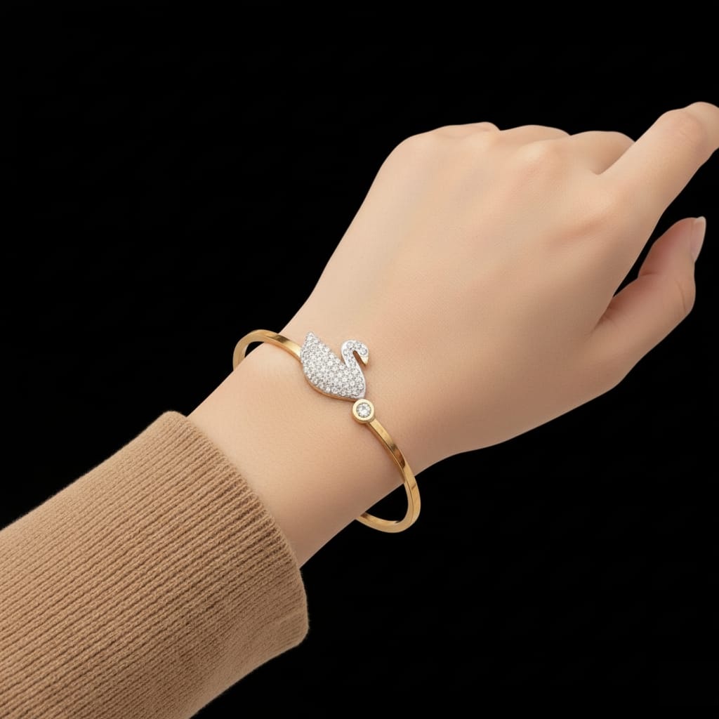 Elegant Gold toned Bracelet with Swan design