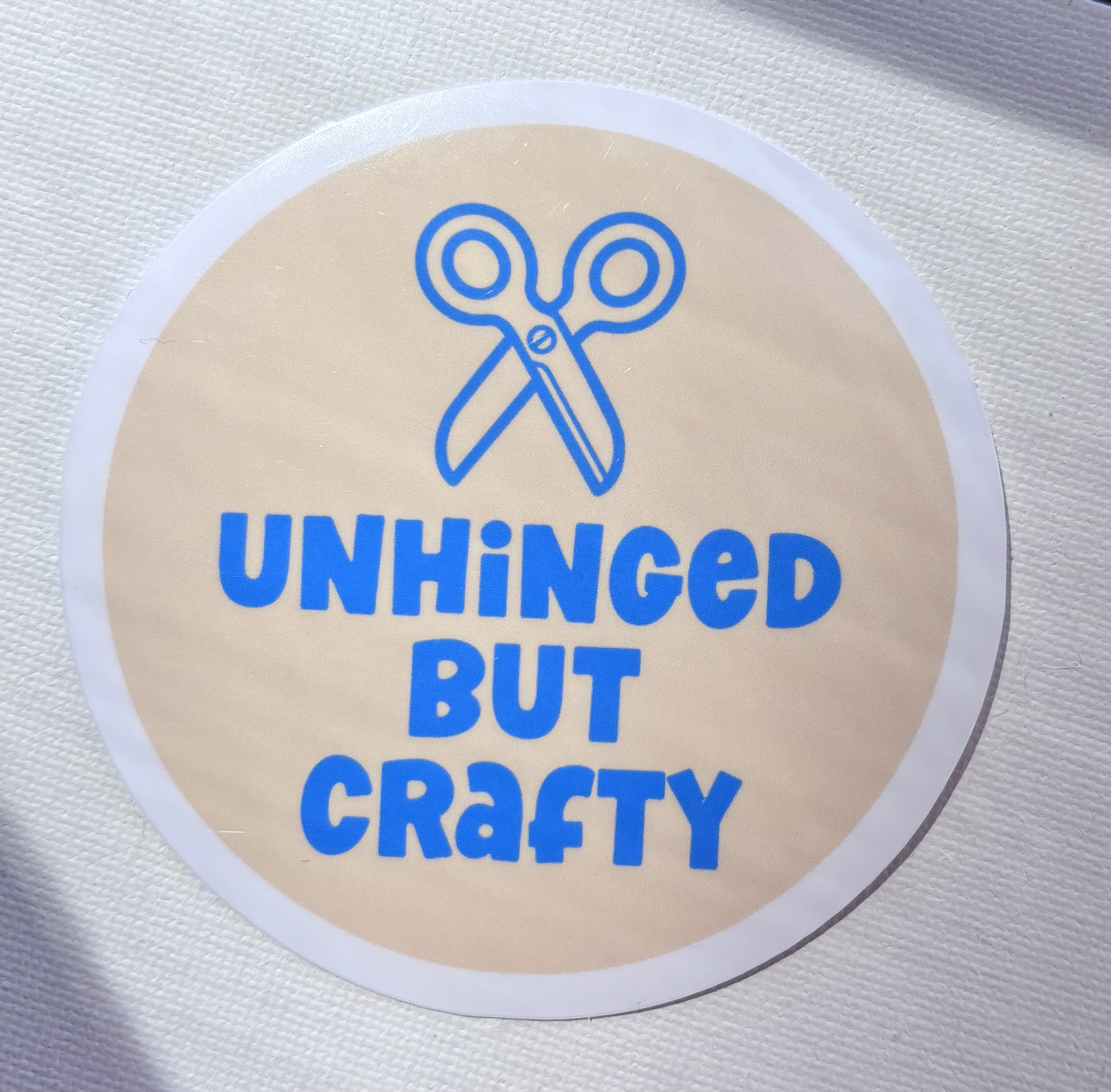 Unhinged But Crafty Sticker