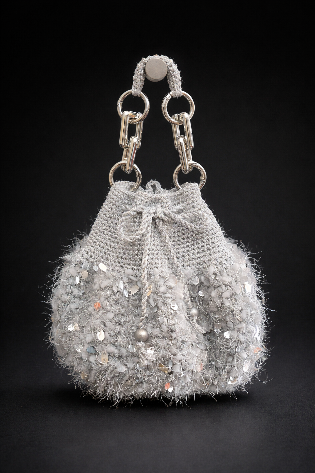 Bolso de mano tejido con lentejuelas