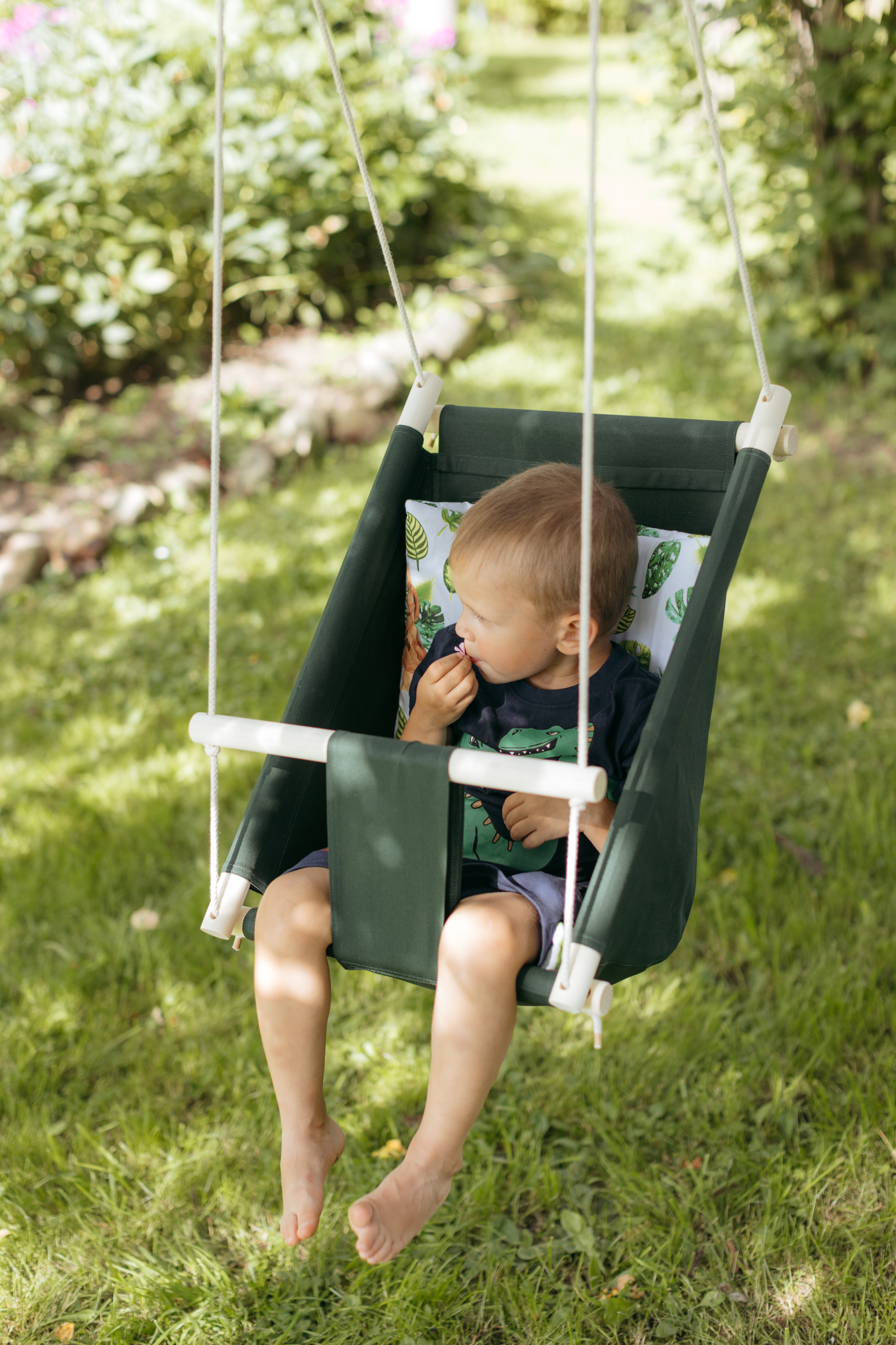 Zaļas kokvilnas šūpoles