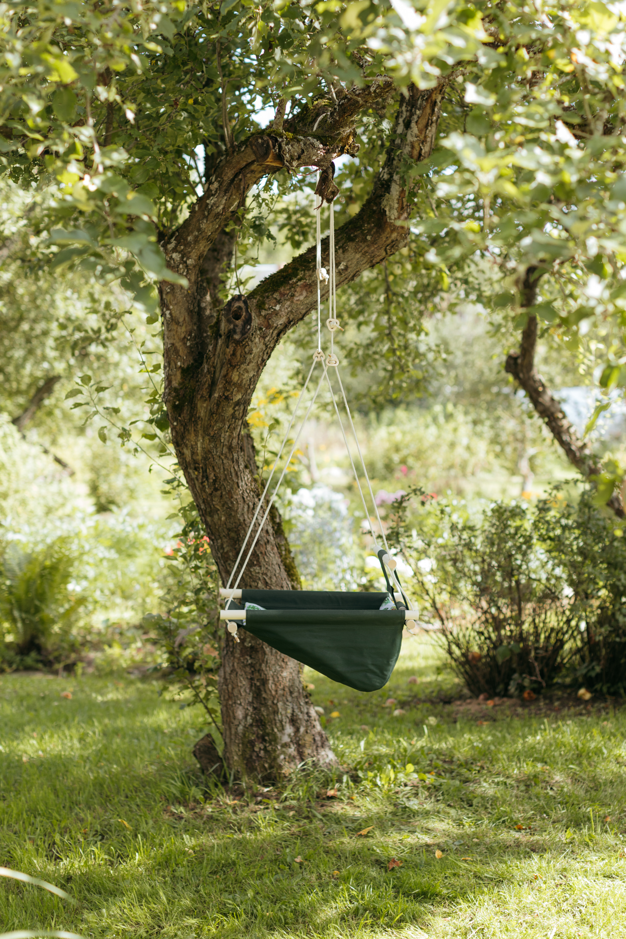 Zaļas kokvilnas šūpoles