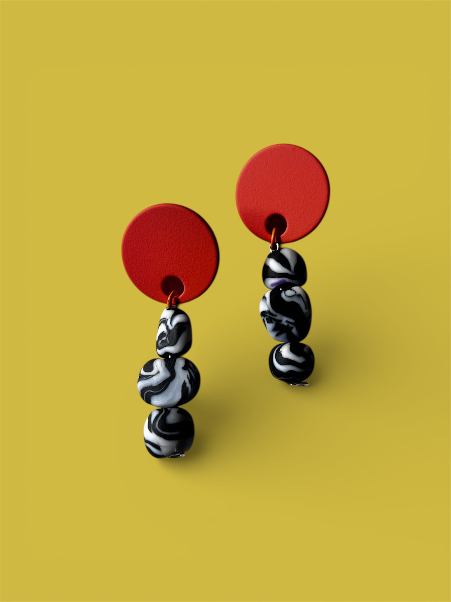 Pendientes naranja y Mármol 