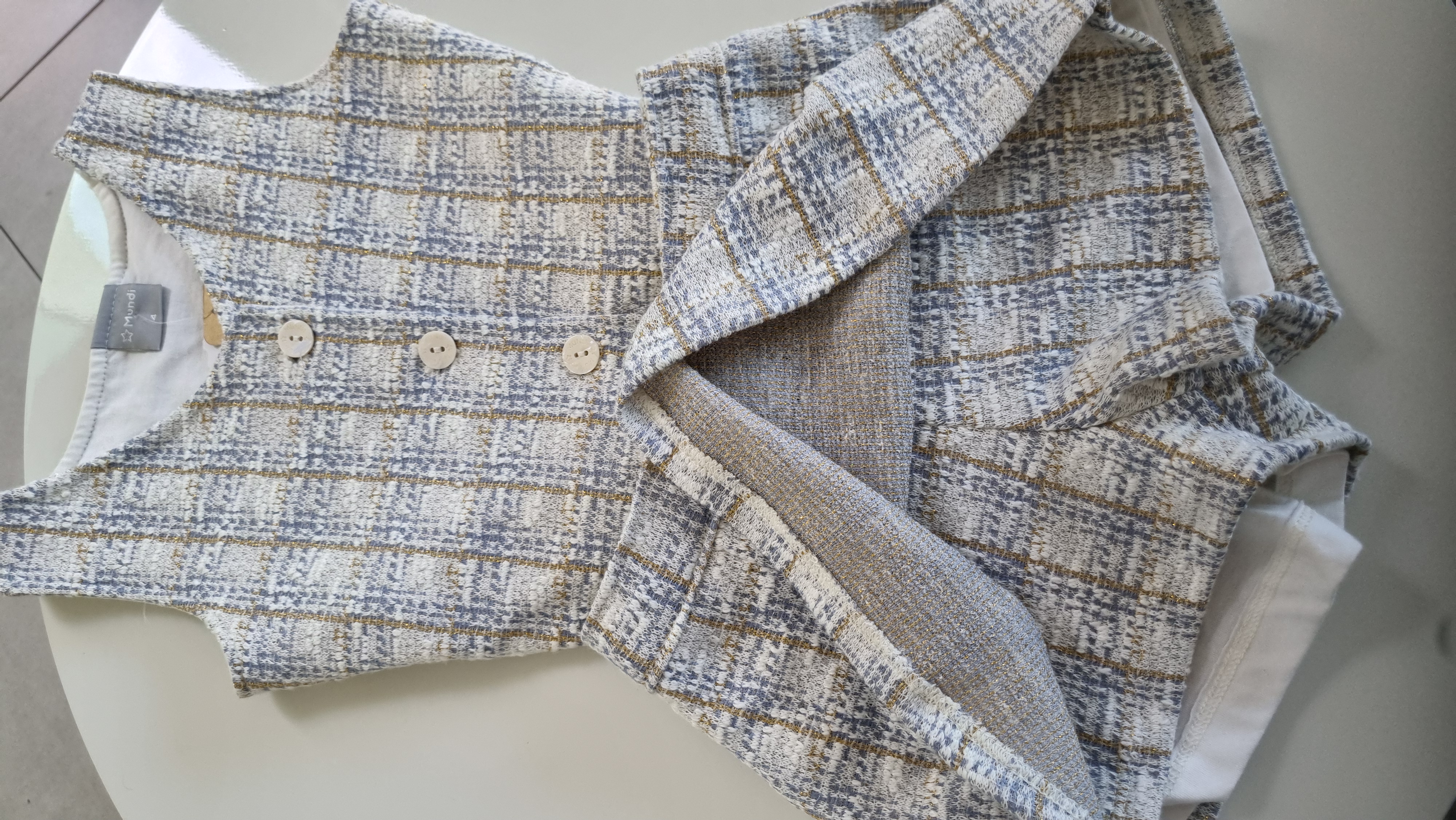 Conjunto colete e shorts da Mundi