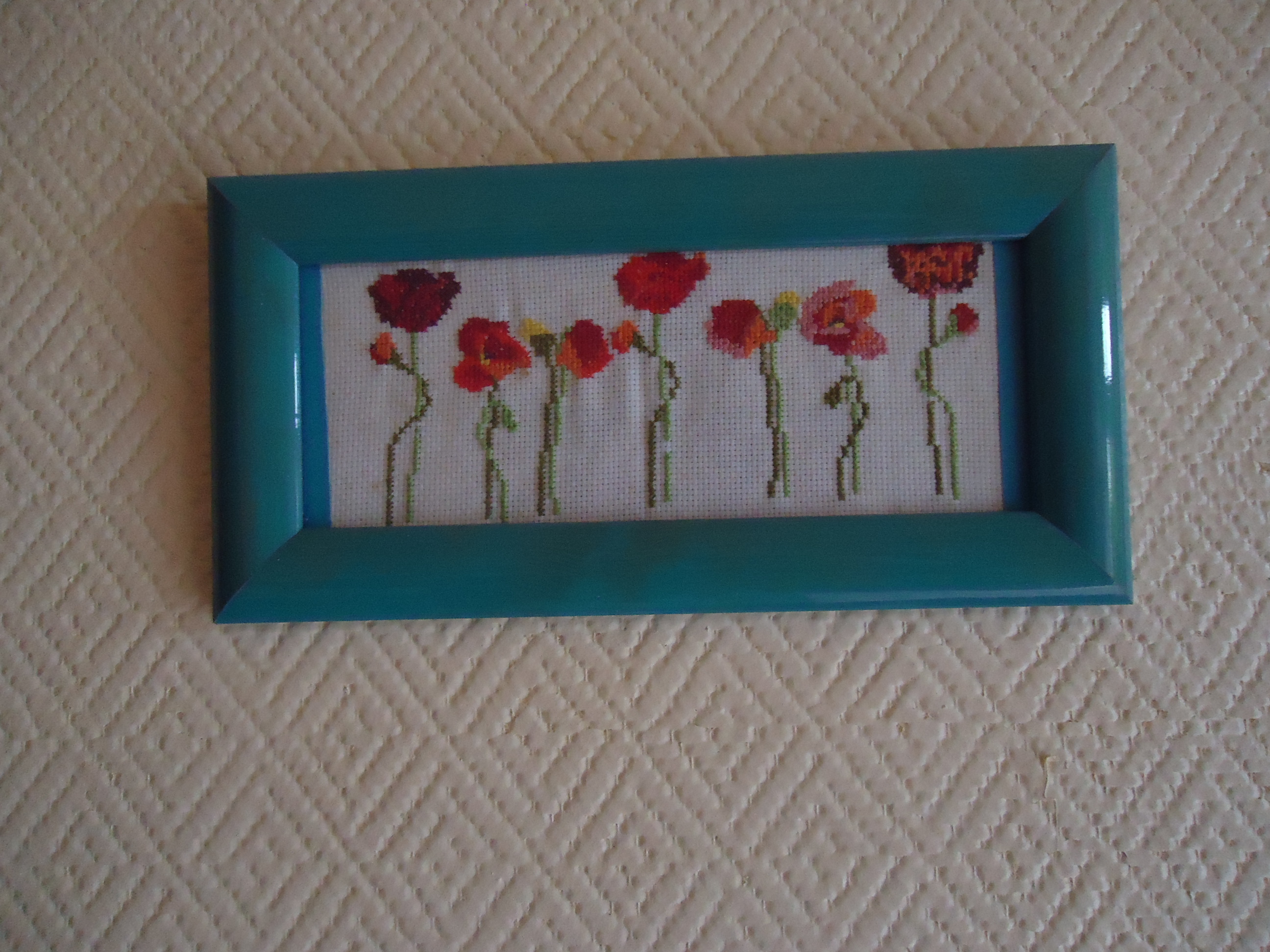 Tableau brodé de coquelicots