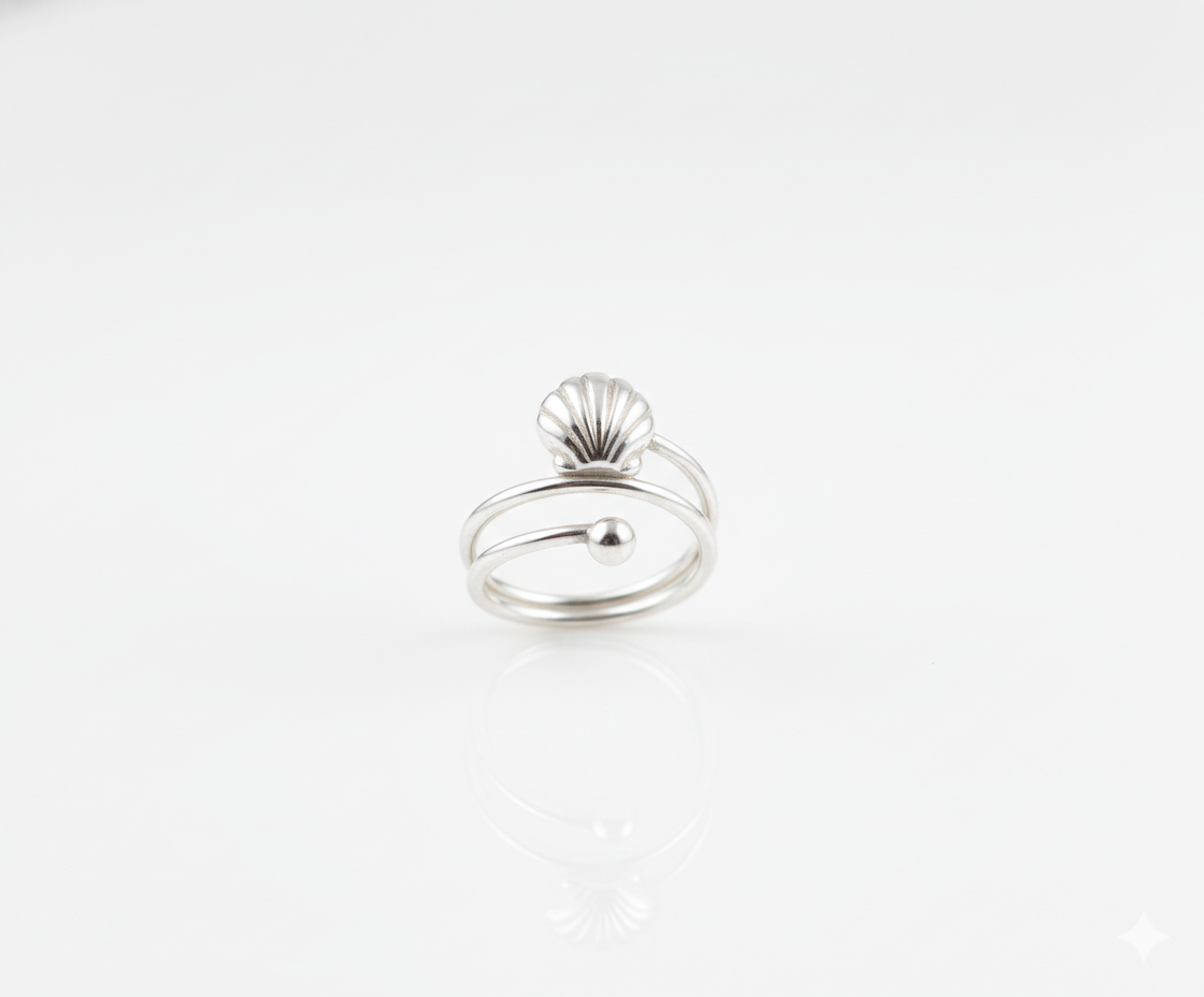 Anillo espiral de concha de mar