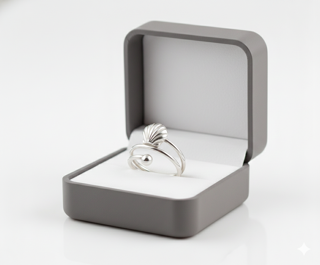 Anillo espiral de concha de mar