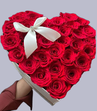 Caja de rosas rojas en forma de corazón