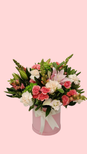 Arreglo floral en caja rosa