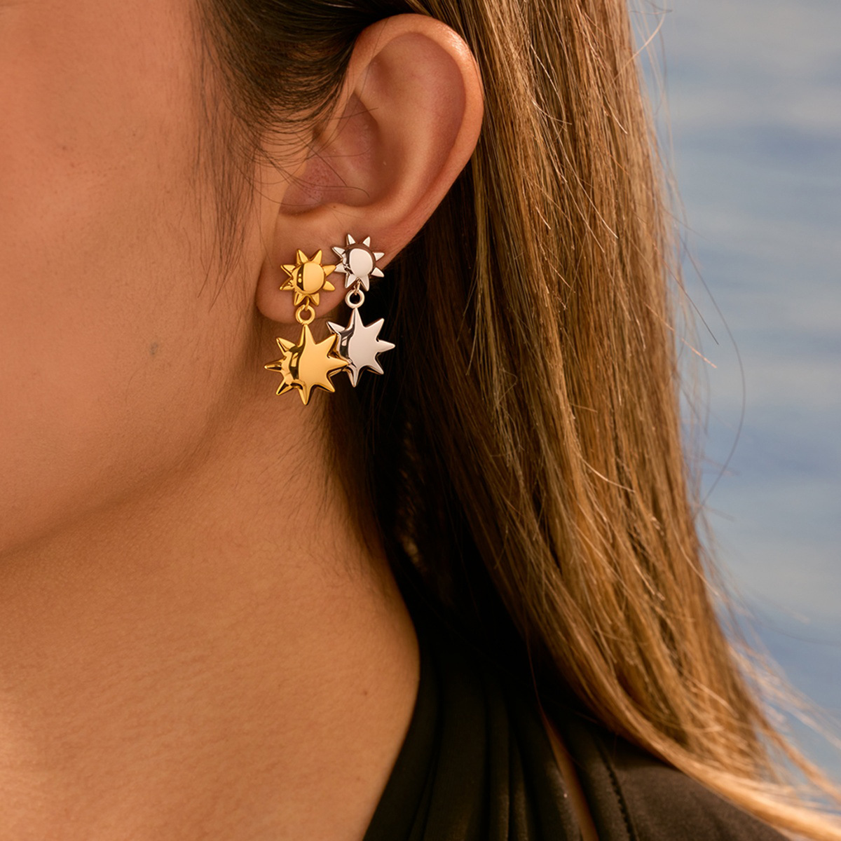 Stainless steel polished sun earrings 502041