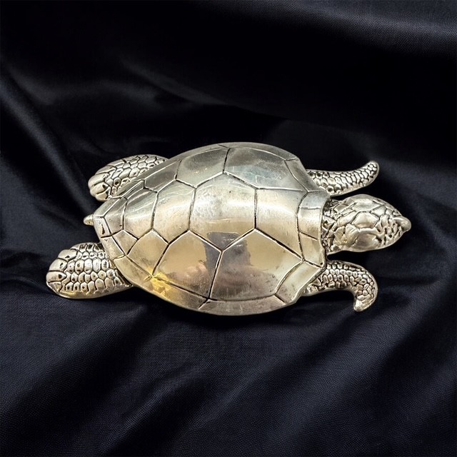 Silver turtle figurine