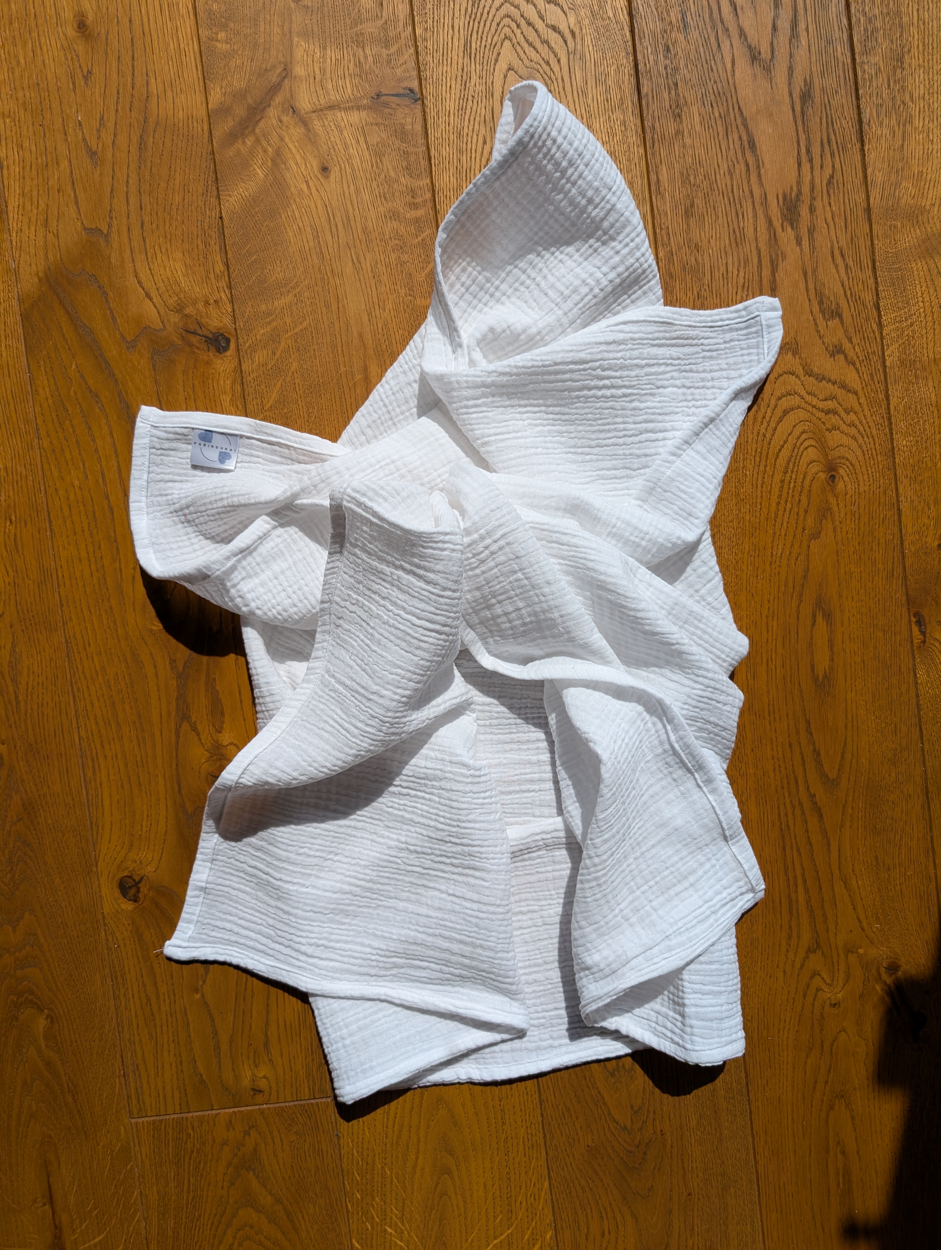 Didelis muslino merliukas - Pieno balta