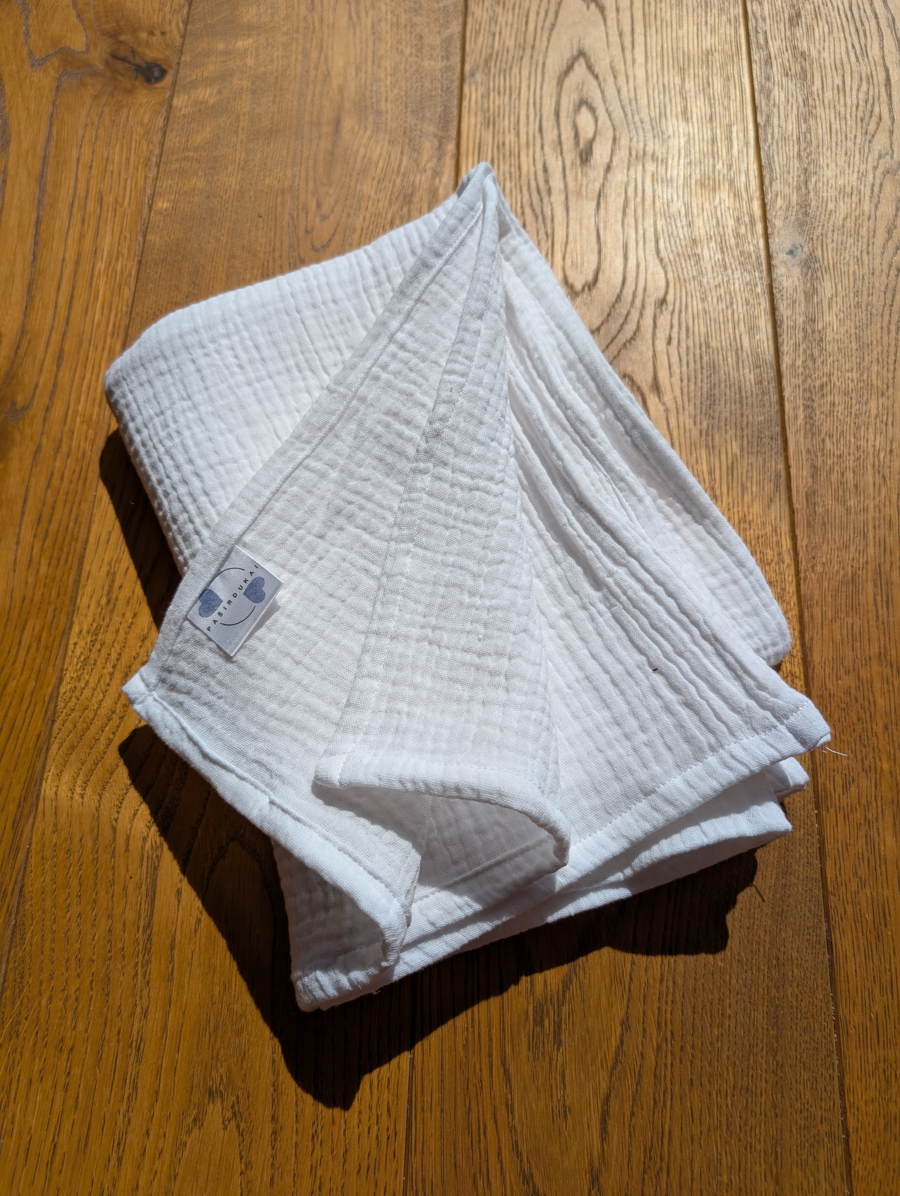 Didelis muslino merliukas - Pieno balta