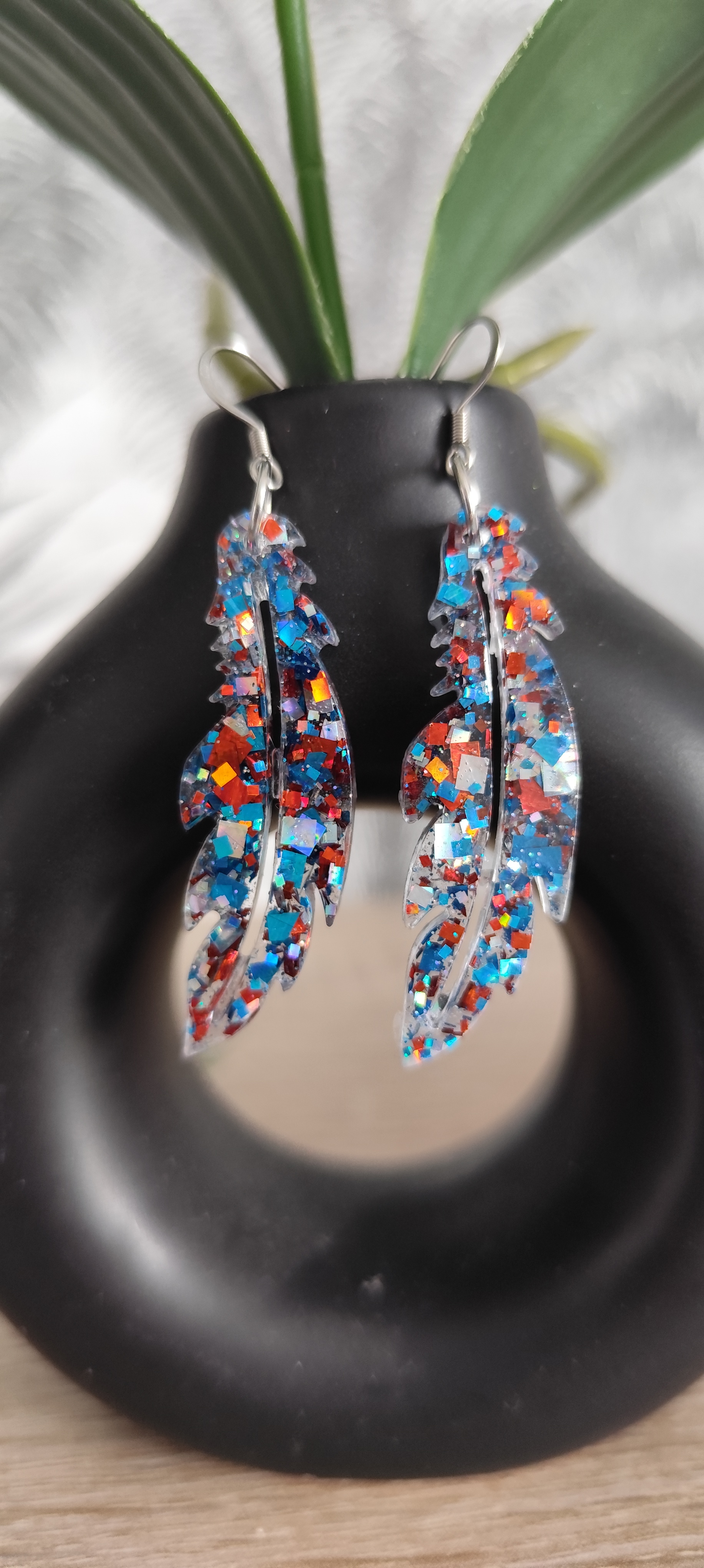 Boucles d’oreilles plumes pailletées