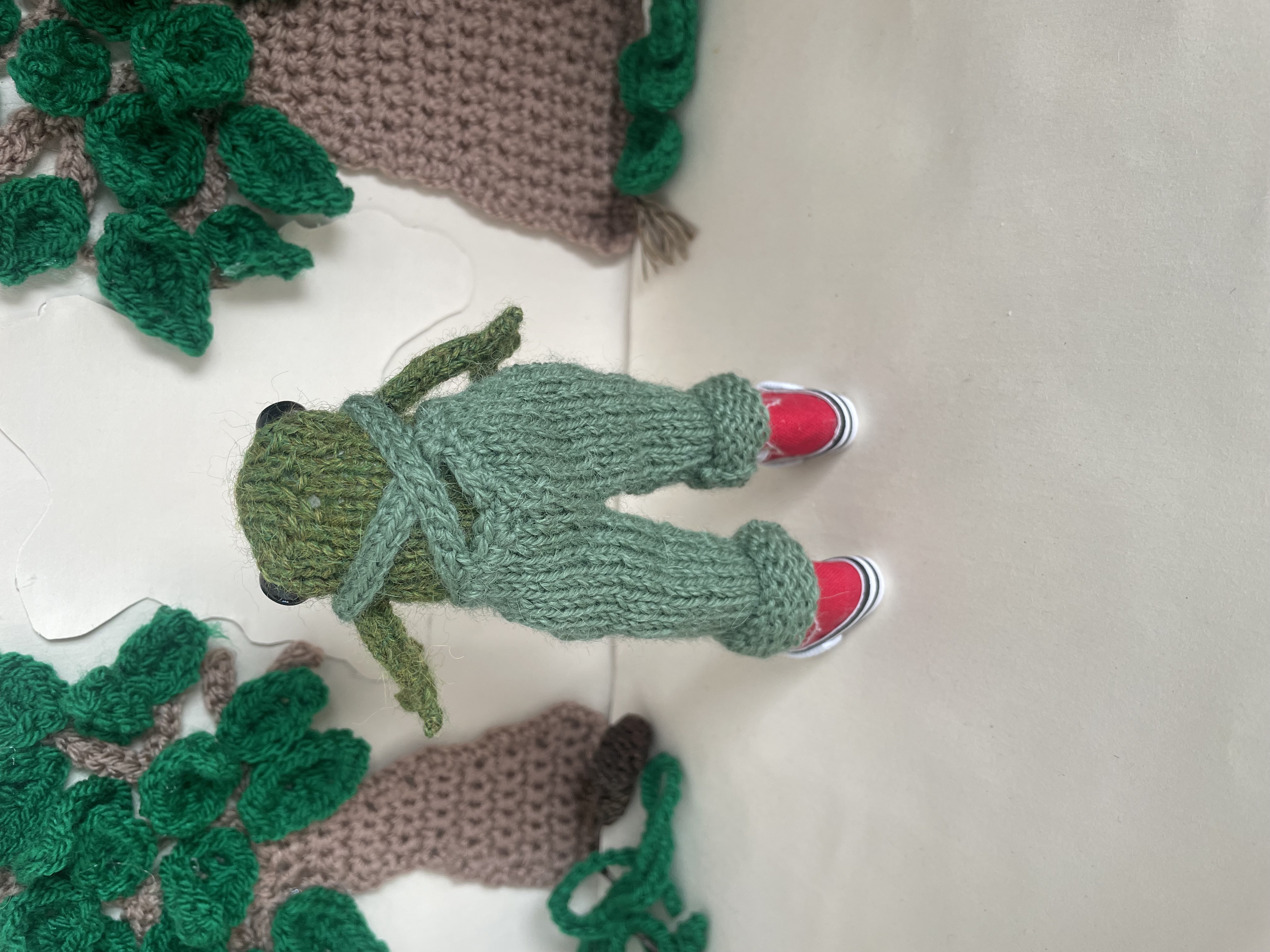 Timmy the knitted Frog in his dungarees 