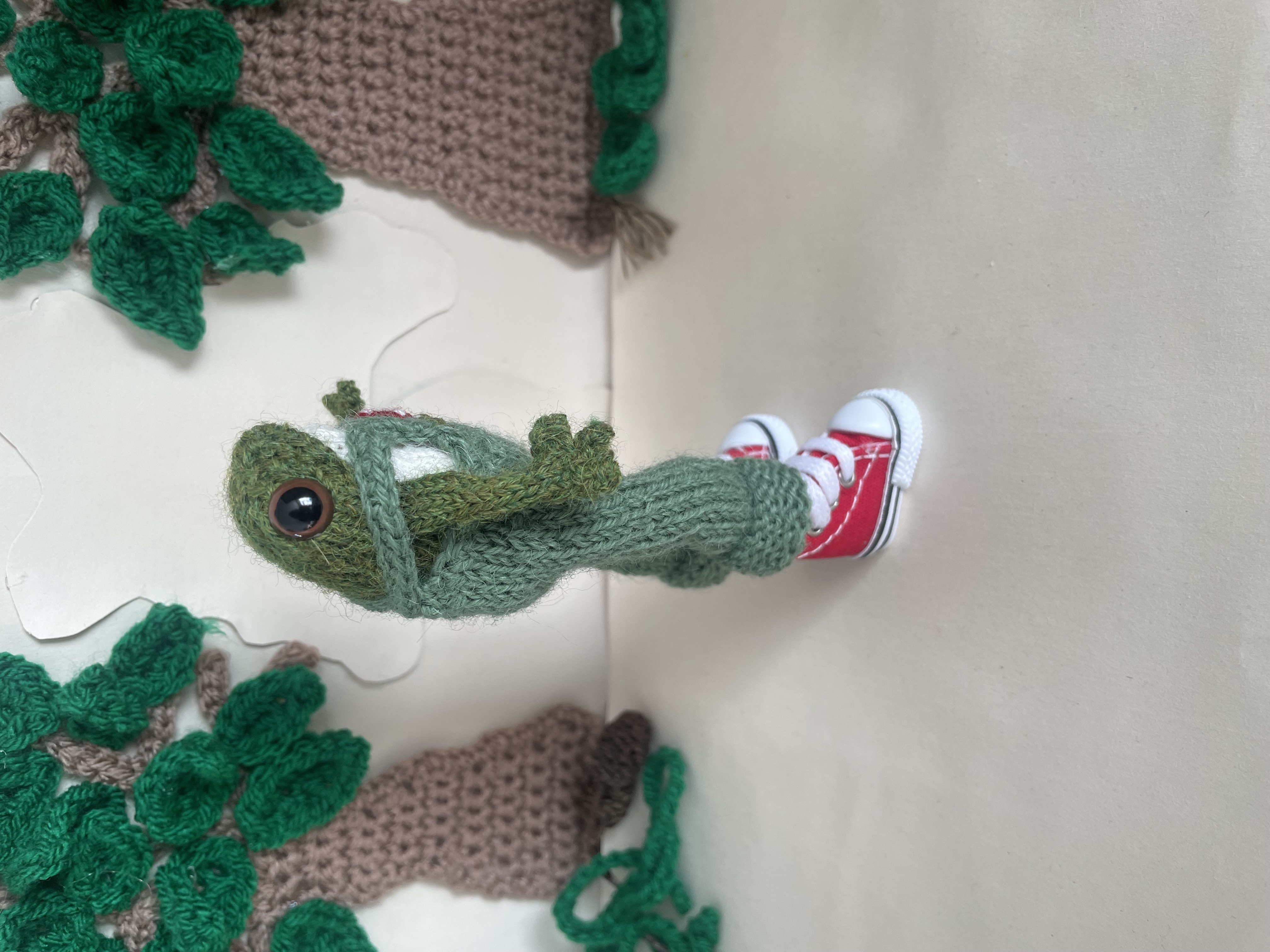 Timmy the knitted Frog in his dungarees 
