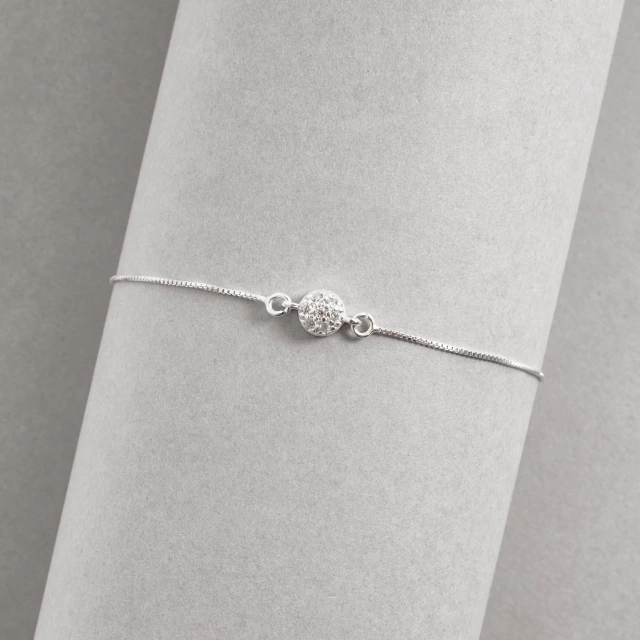 Pulseira entremeio botão cravejado