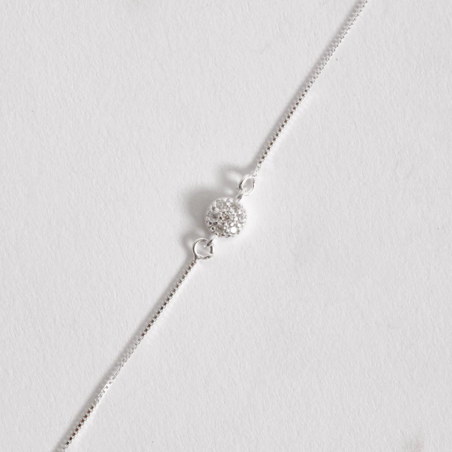 Pulseira entremeio botão cravejado