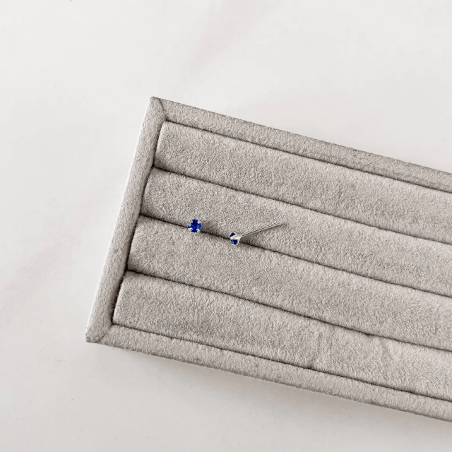 Brinco zircônia redonda azul