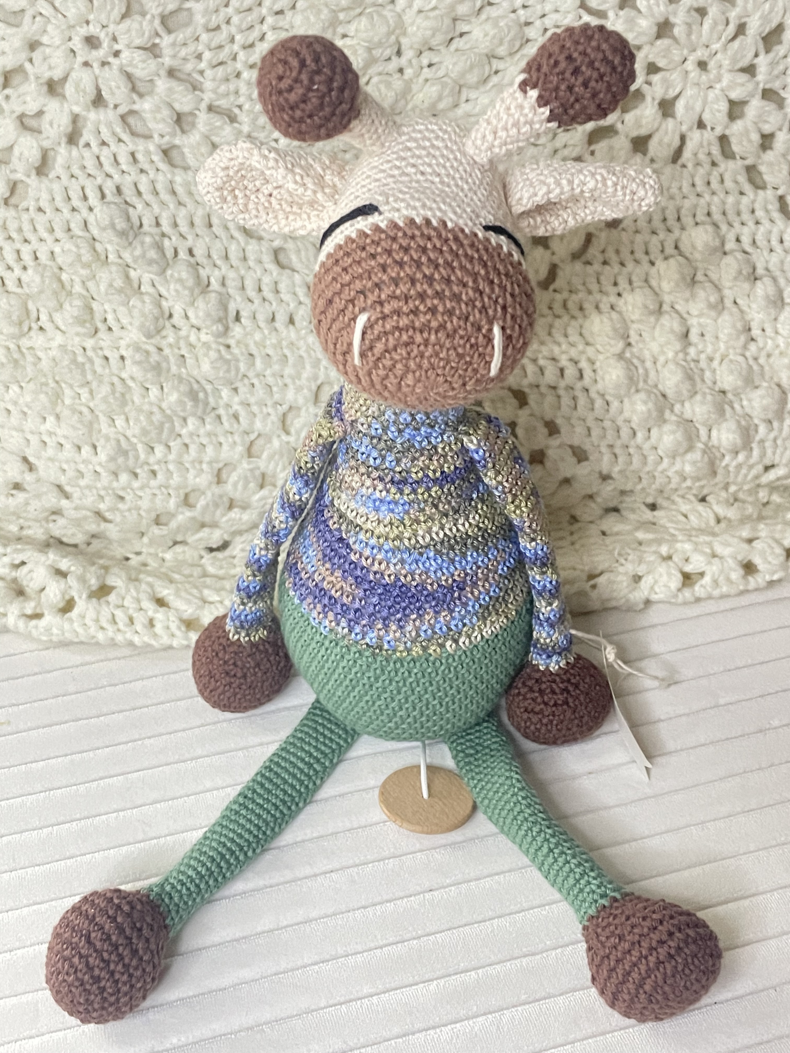Boîtes à musique girafes crochetées