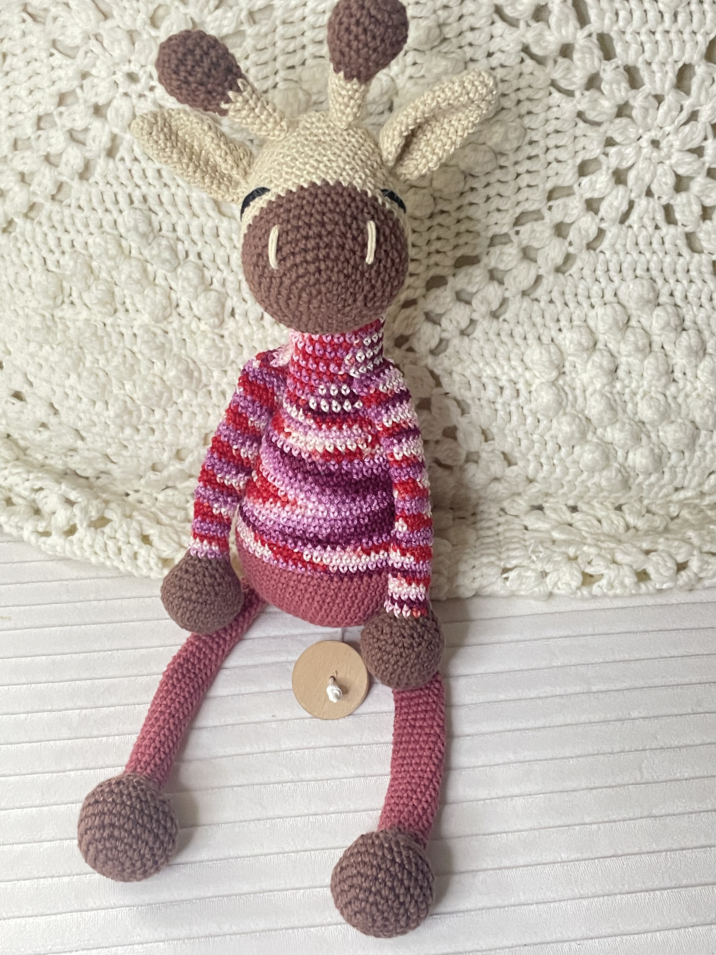 Boîtes à musique girafes crochetées