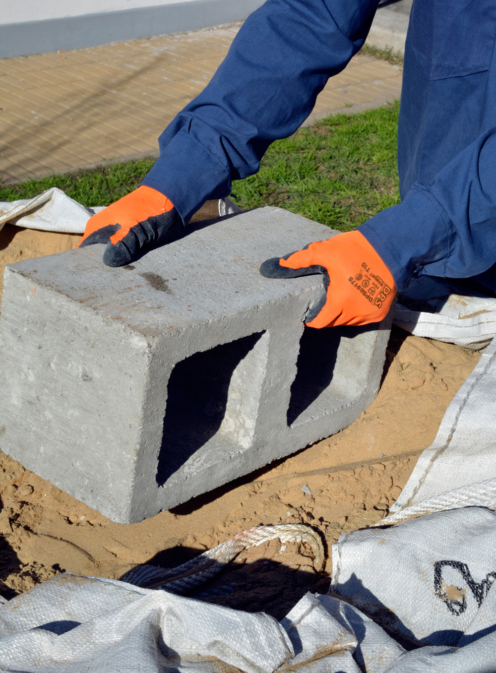 GUANTE SIN COSTURA NARANJA RECUBIERTO EN LATEX RUGOSO NEGRO DE PASCALE