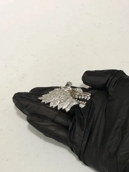 Dije  Cabeza de Leon Diamantado .925