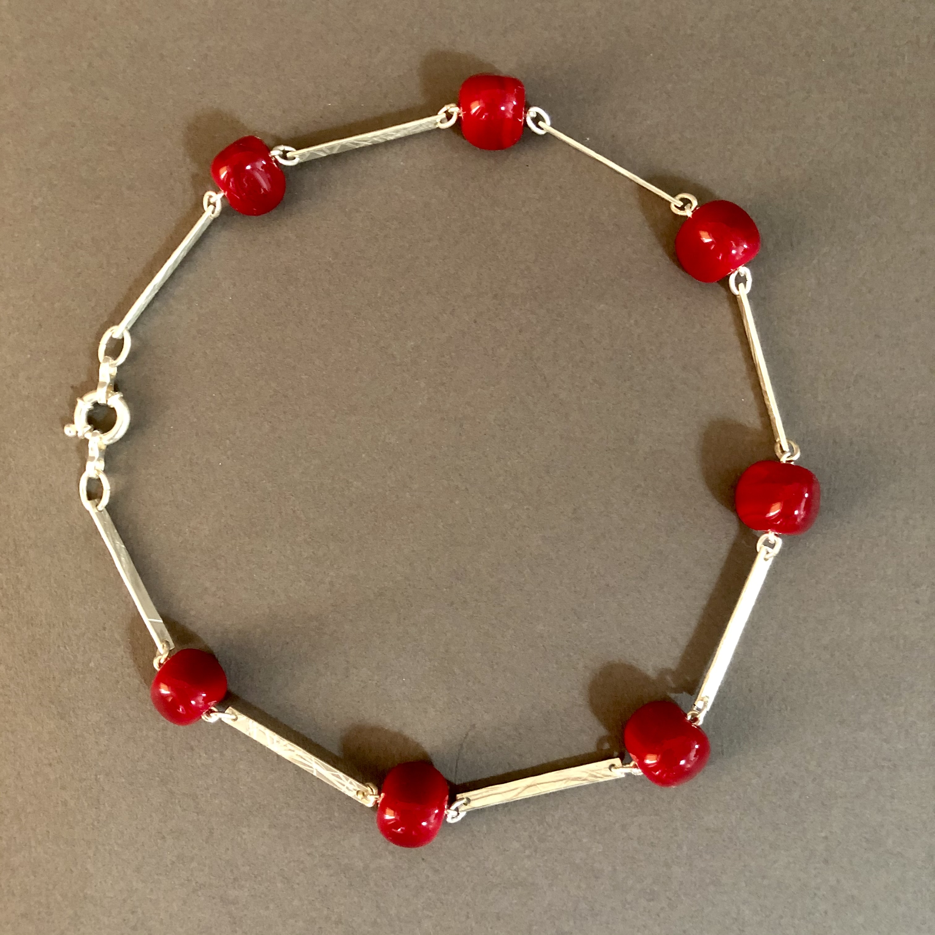 Bracelet perles rouges