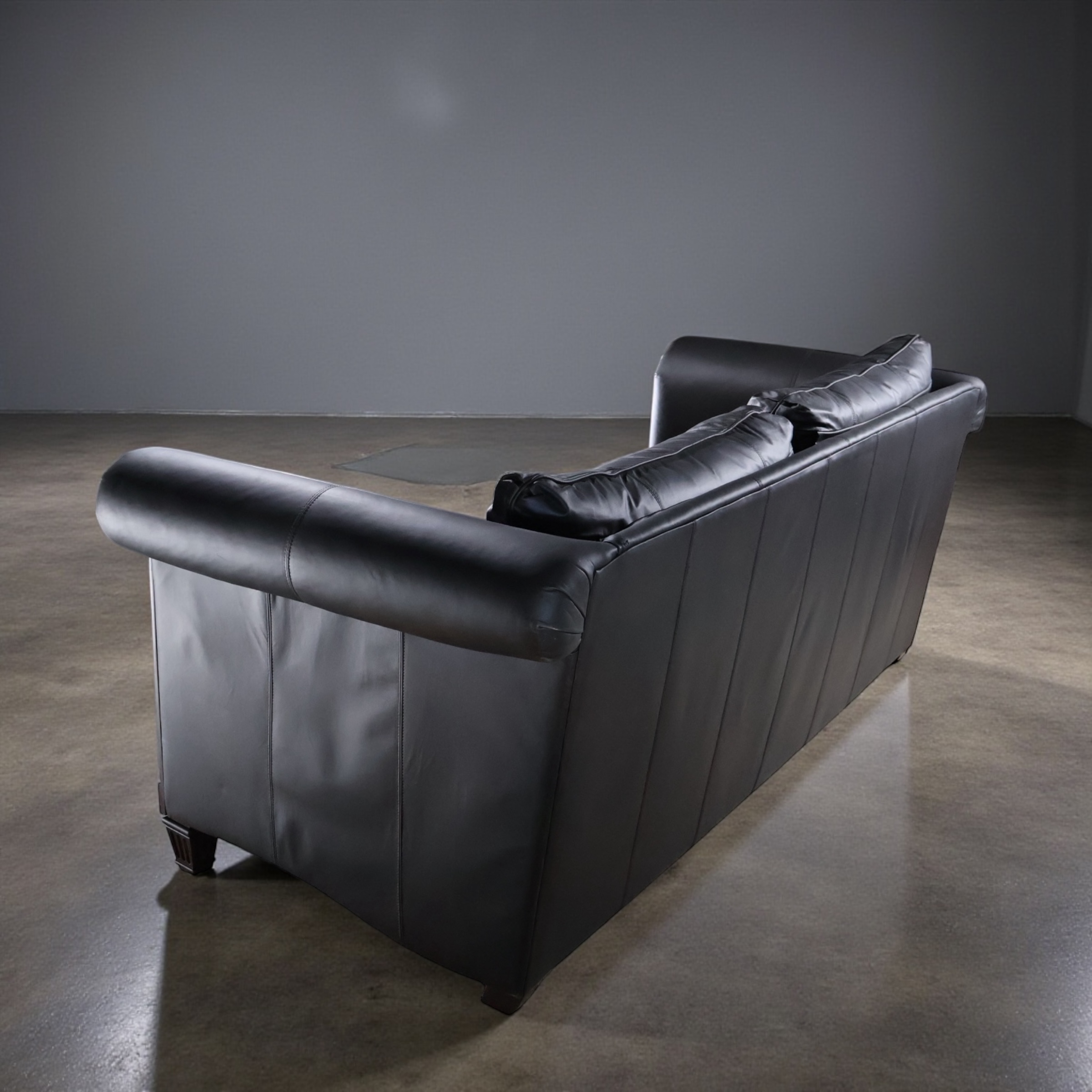 OOM Noir Scroll Arm Leather Sofa — Studio Collector Edition
