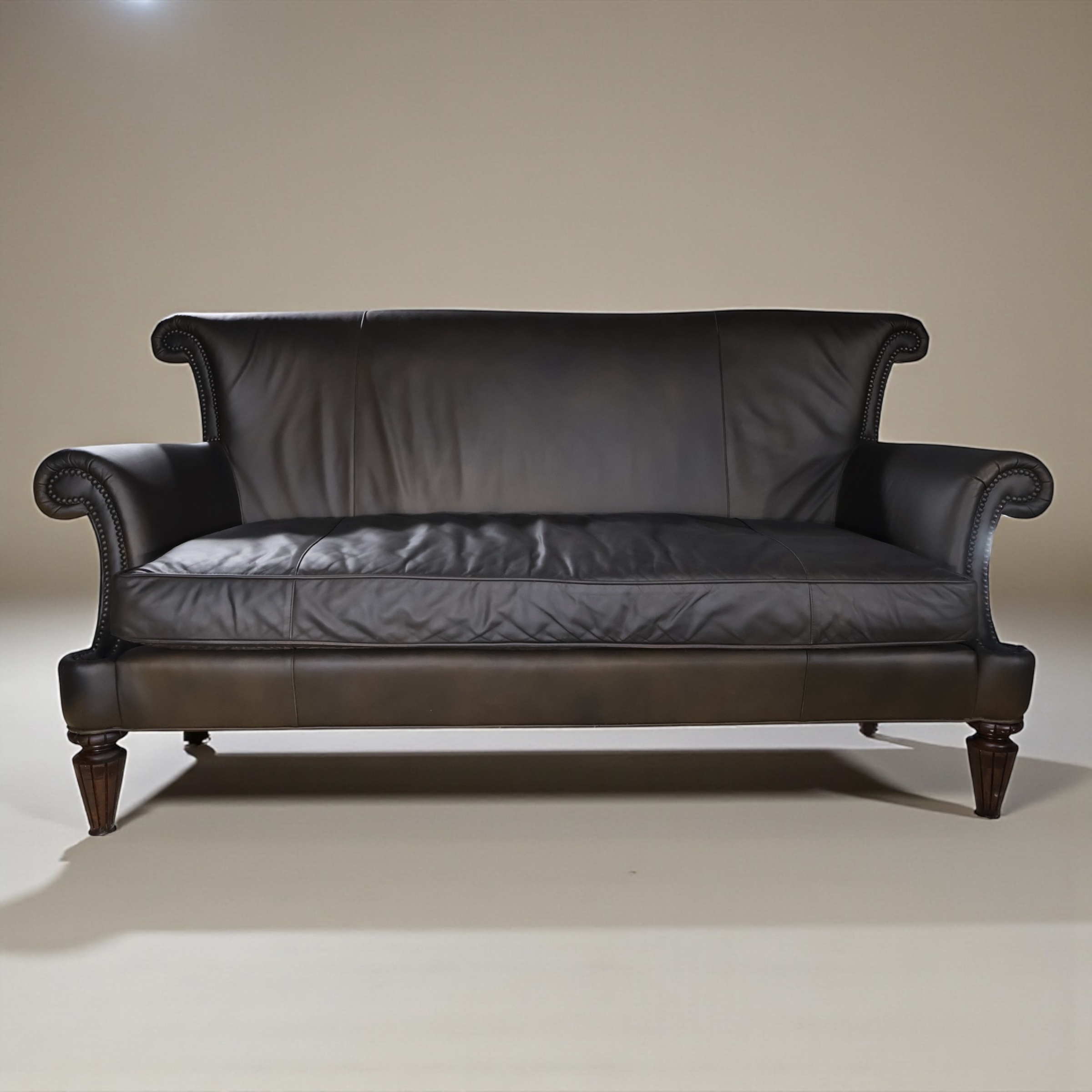 LOOM Noir Scroll Arm Leather Sofa — Collector Studio Edition