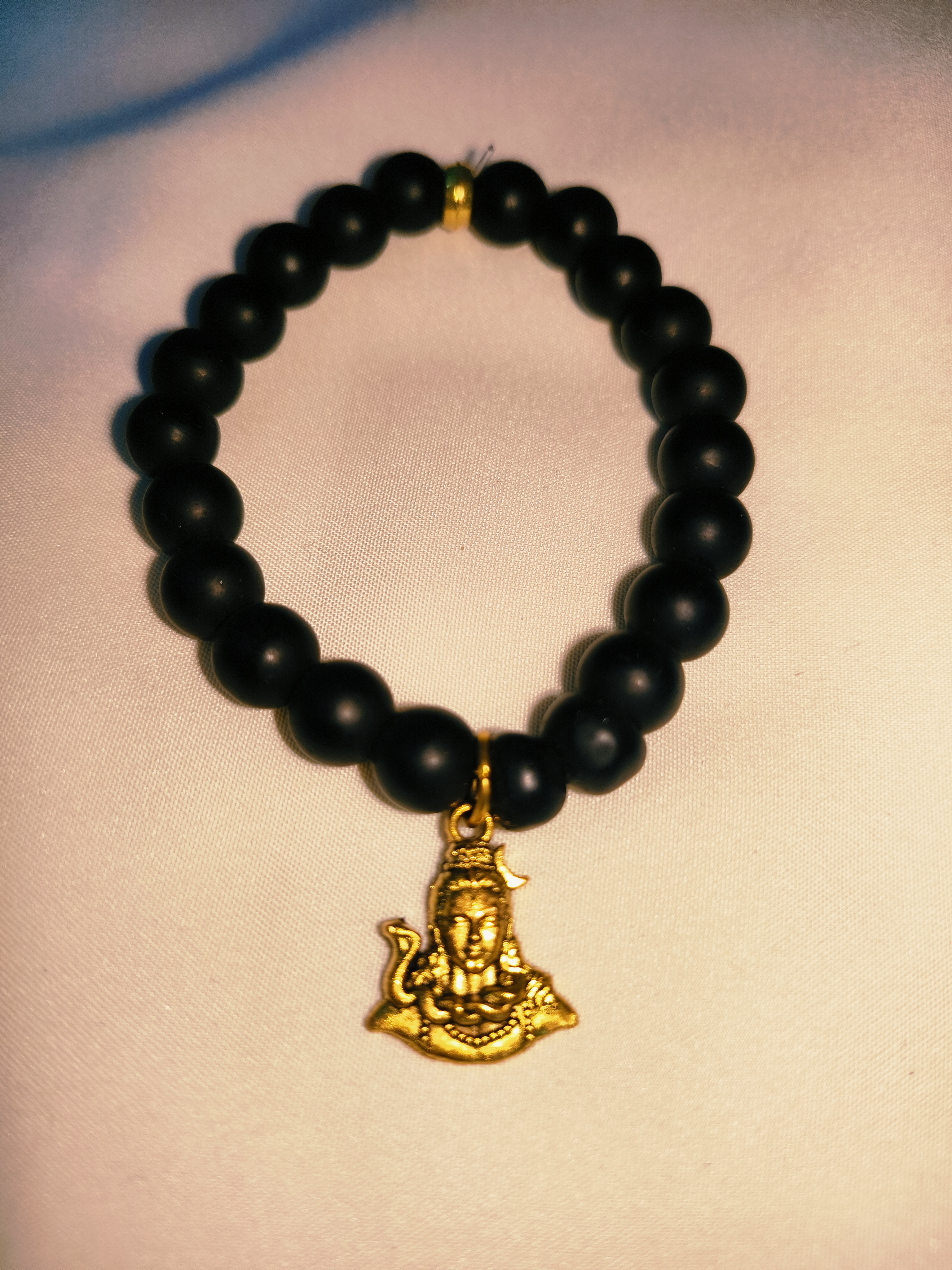 Black Bead Bracelet with Gold God Charms
