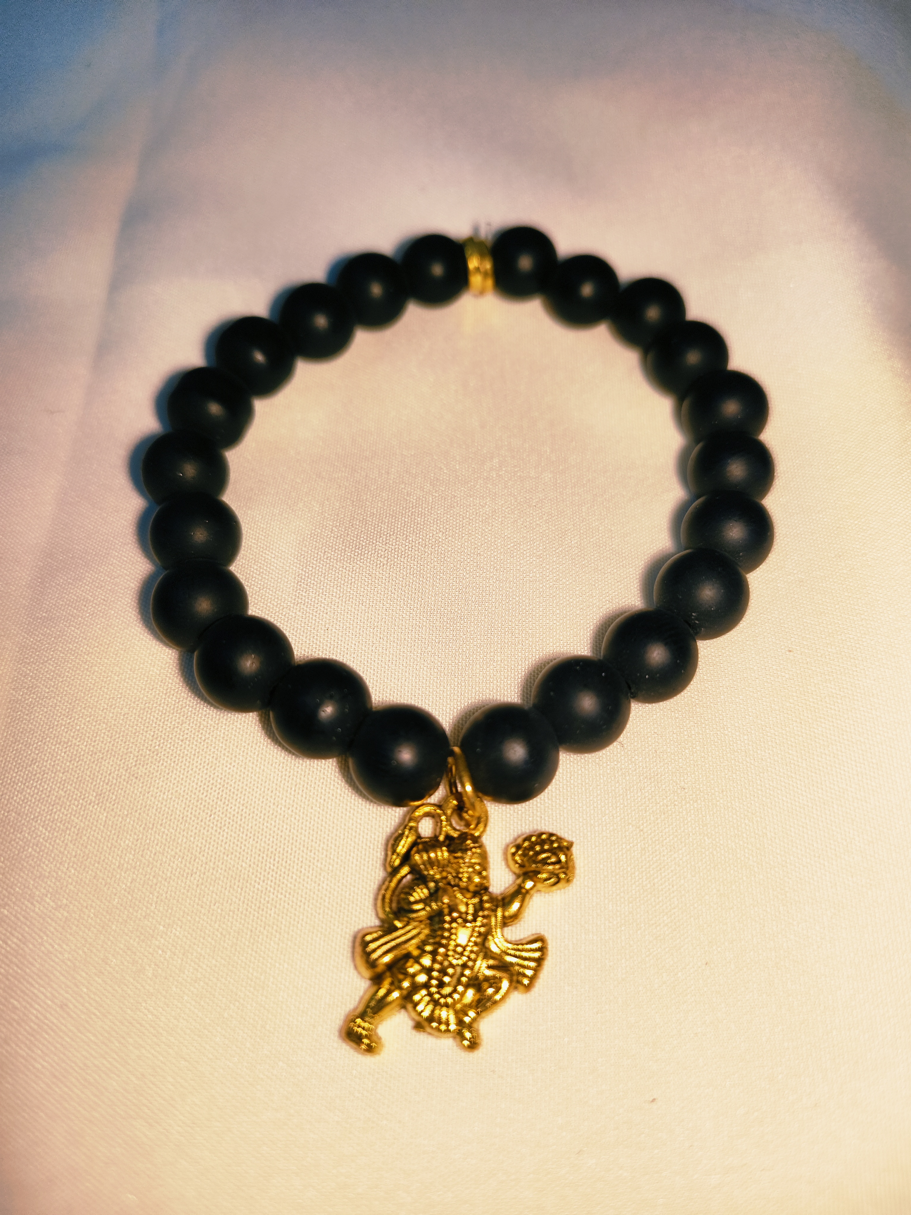 Black Bead Bracelet with Gold God Charms