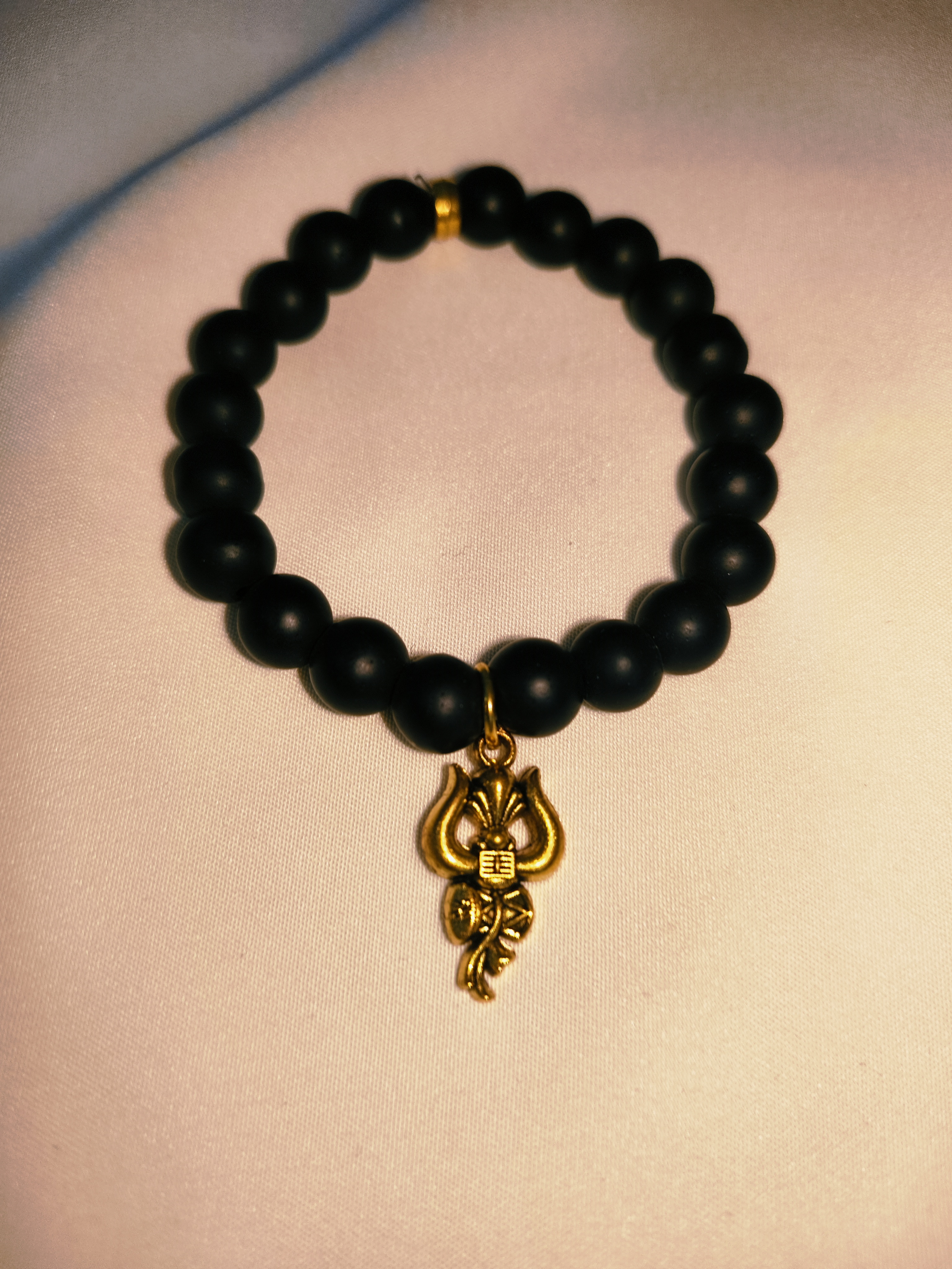 Black Bead Bracelet with Gold God Charms