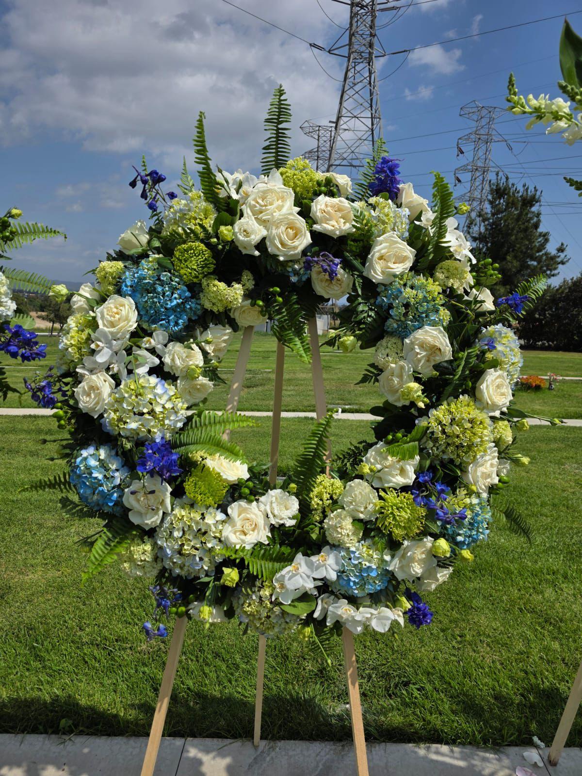Elegant Blue & White Floral Funeral Wreath