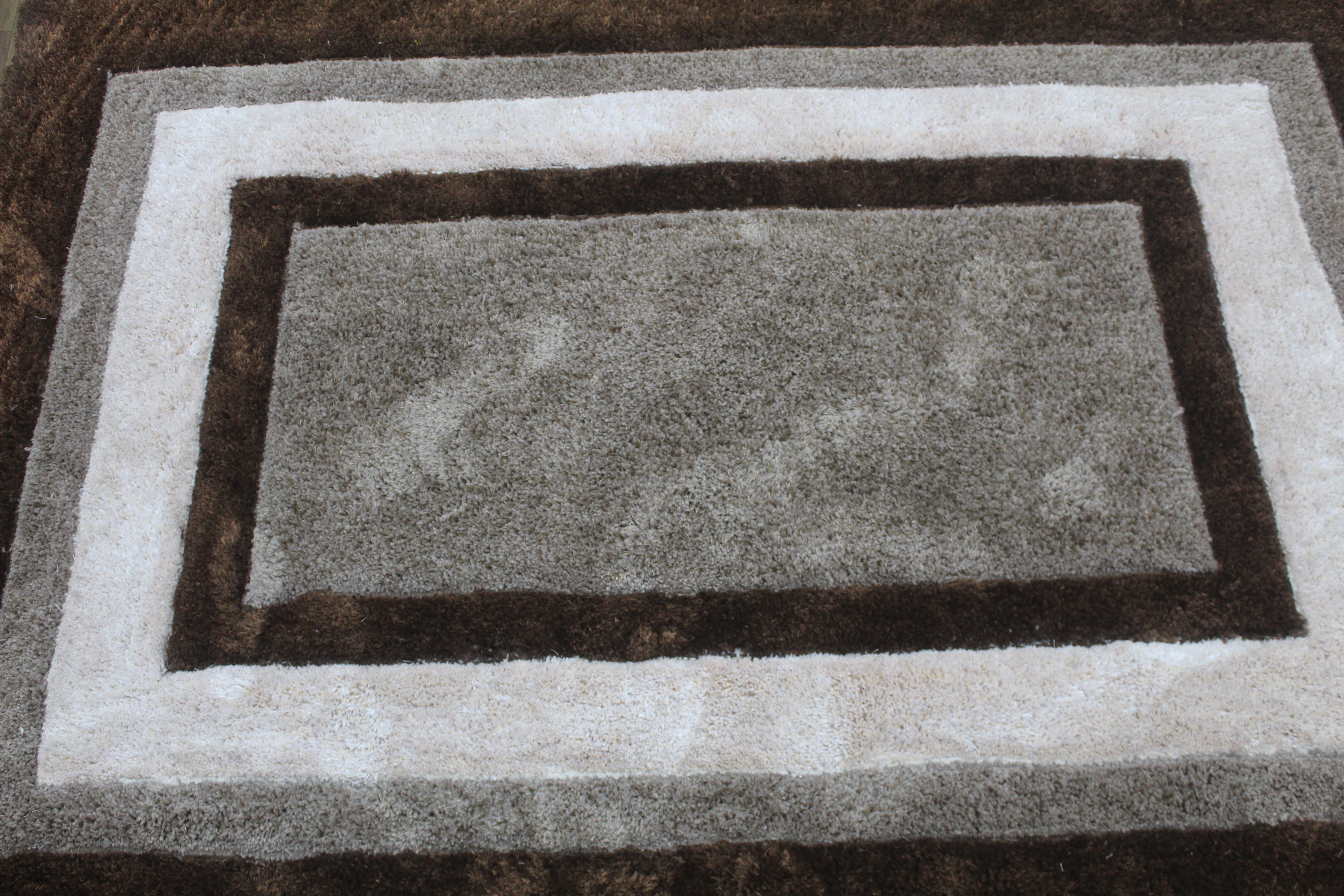 Handmade Wool Area Rug – Modern Layered Border Design in Neutral Tones