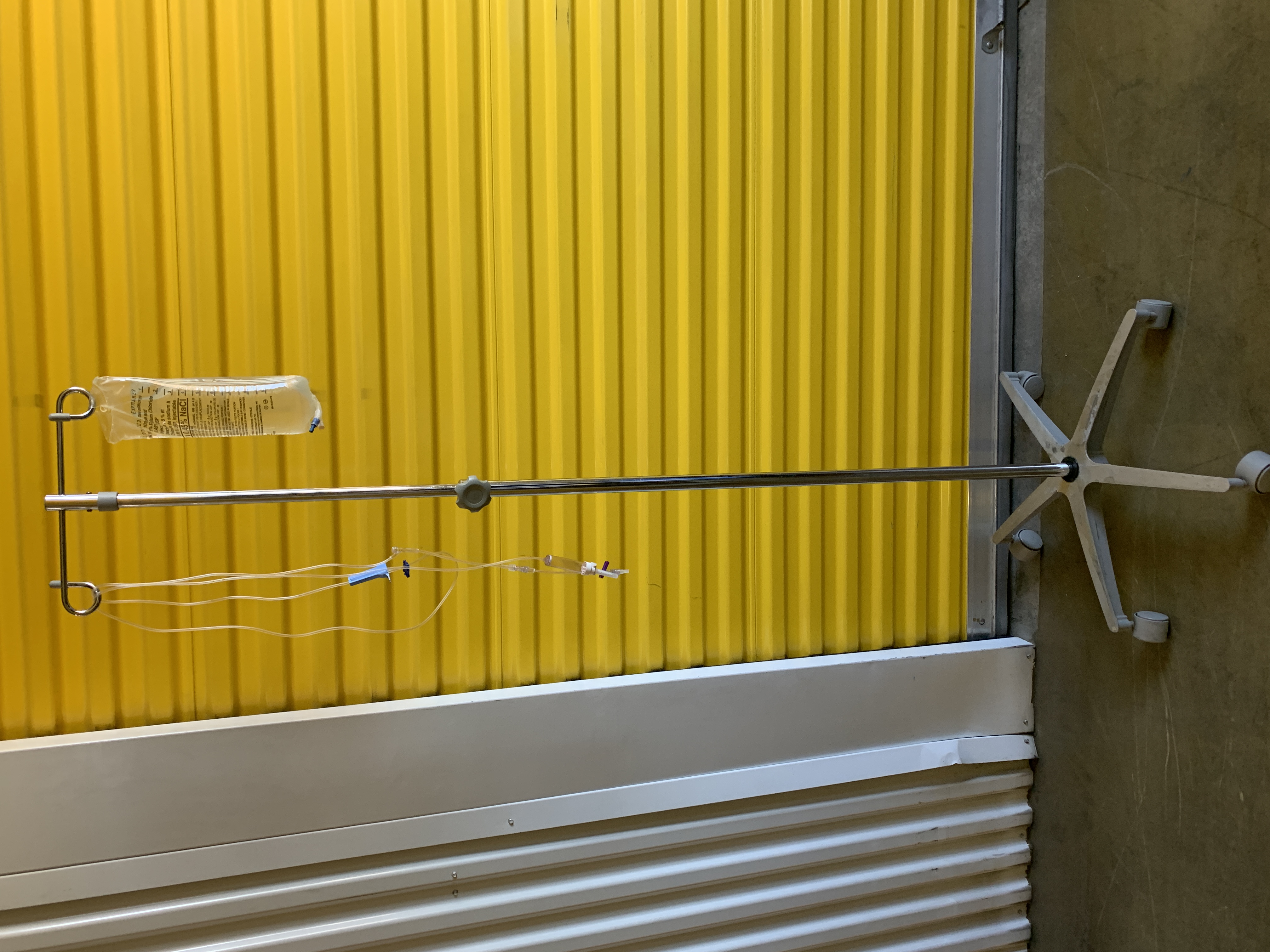 IV Pole Stand with Saline Bag and Tubing