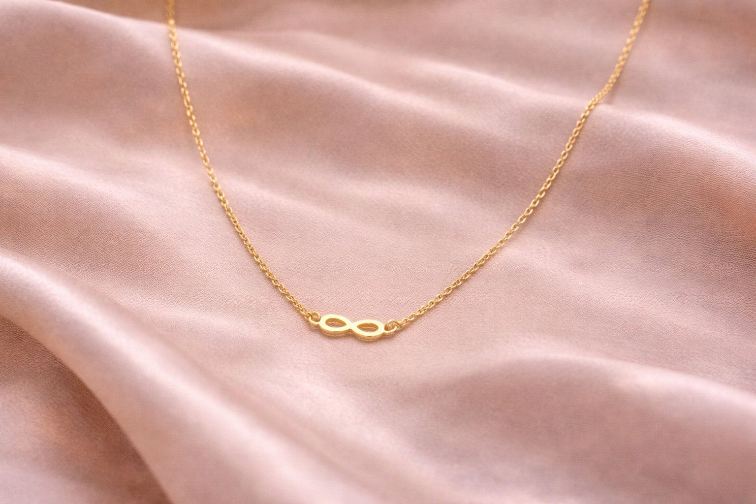 Medicininio 18K aukso begalybės pakabukas. 41cm.+5cm.