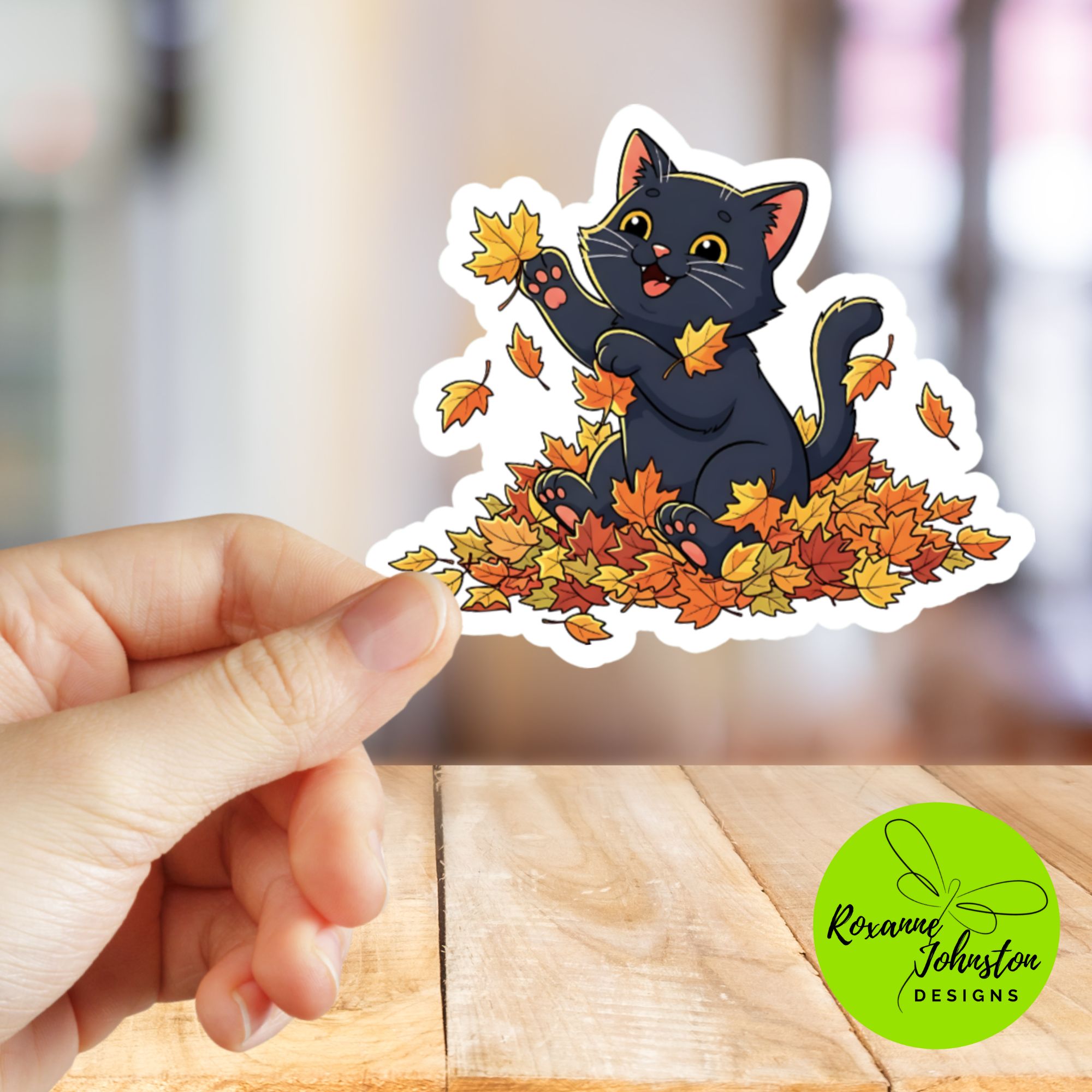 Happy Black Cat in Leaves Sticker
