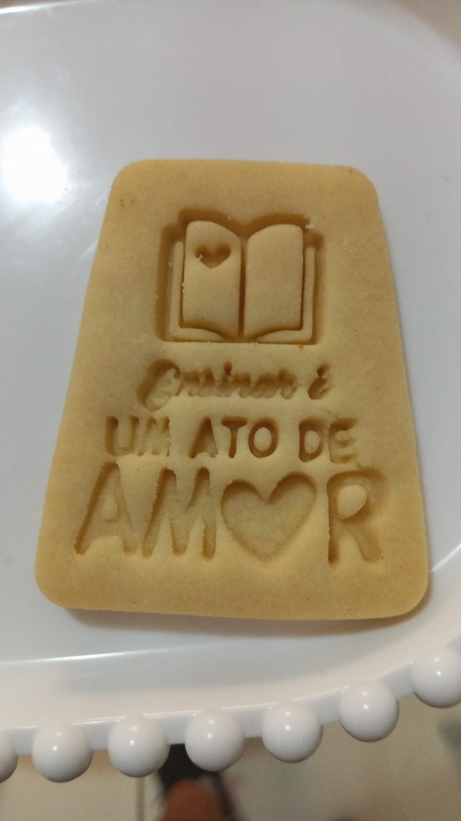 Cortador de biscoito ensinar é um ato de amor