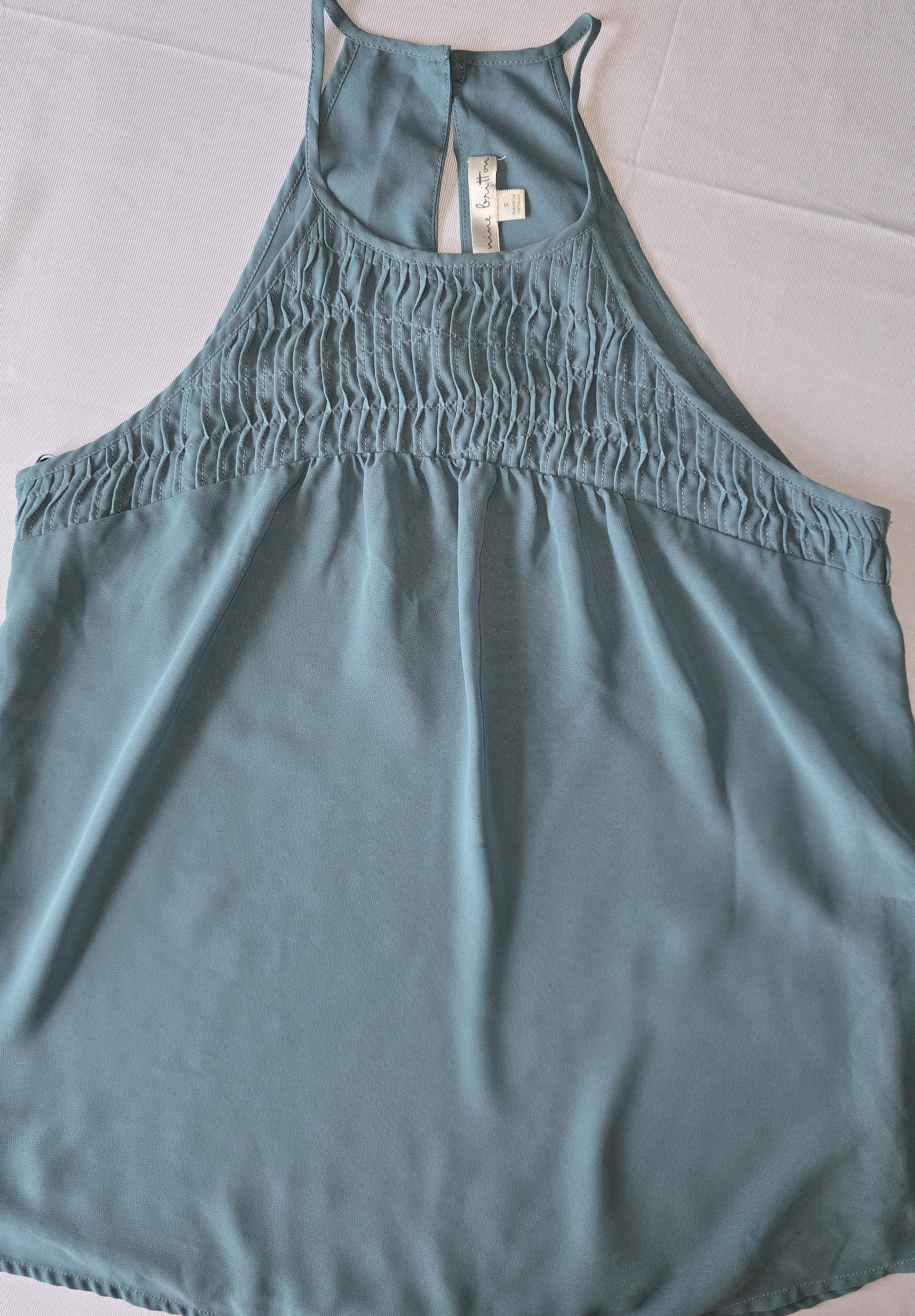 Sleeveless Chiffon Top- nine britton