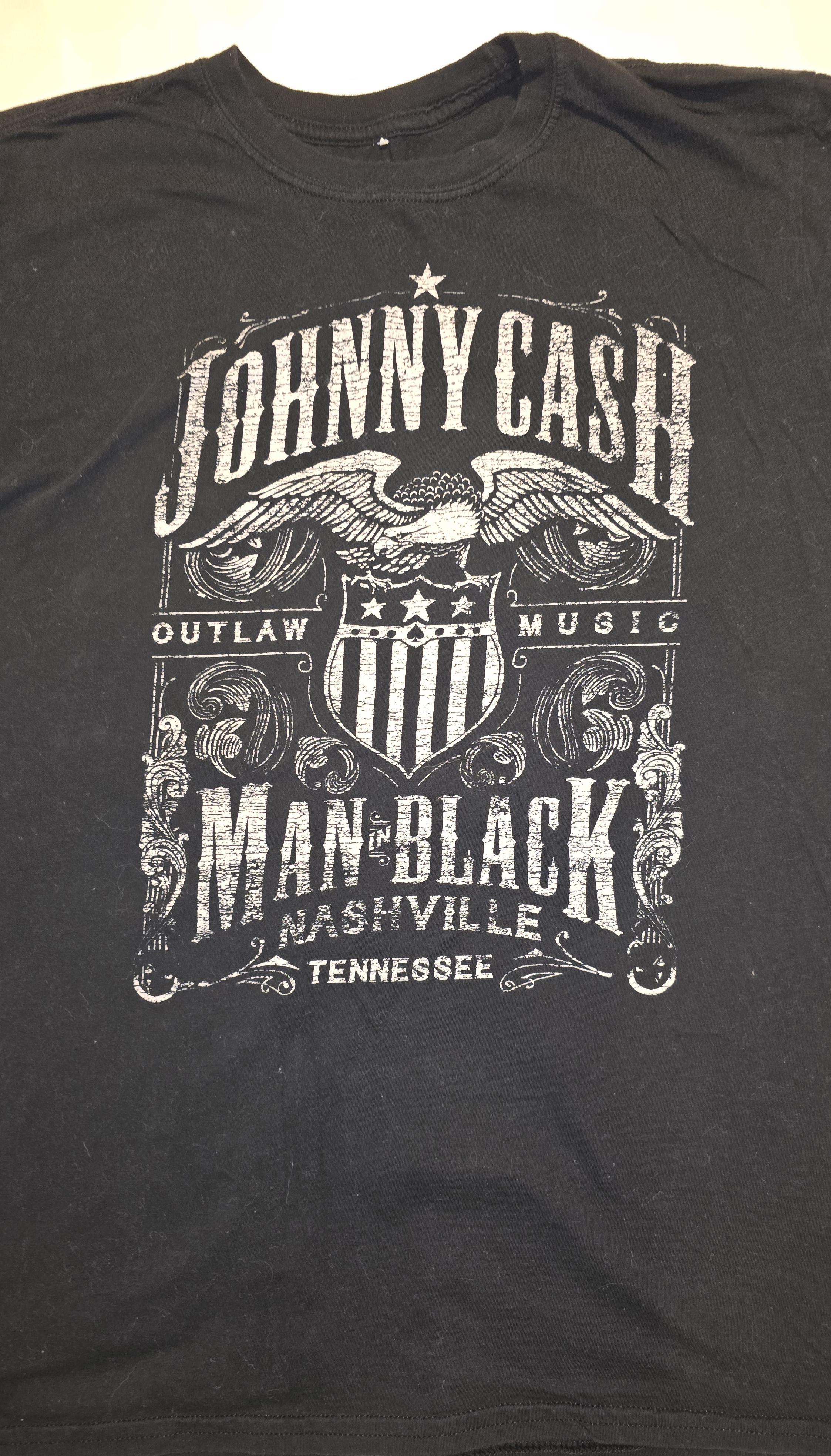 Man in Black T-Shirt- Johnny Cash