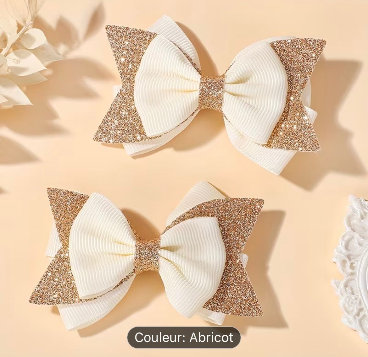 Paire de barrettes à nœud pailleté